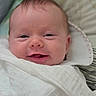 Elya participe au concours pour gagner de l'argent avec cette photo : baby, infant, smiling, wrapped, blanket, face, head, cute, newborn, soft, cozy, portrait, child, skin, expression, indoors, young, happy, person, closeup