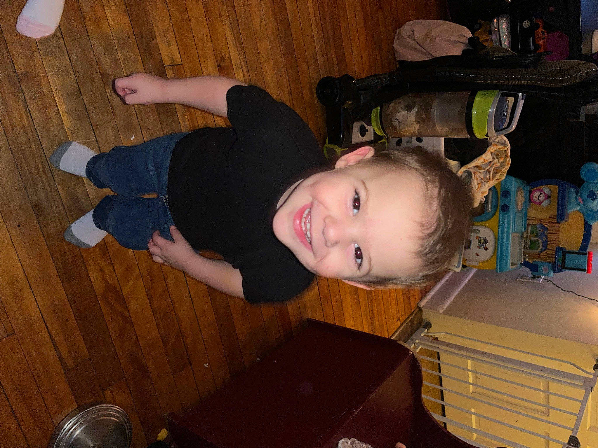 Justin is registered to the contest to win money with this photo: baby, baby_toddler_clothing, child, flooring, fun, hardwood, joy, person, room, smile, tableware, toddler, varnish, wood, wood_flooring, wood_stain