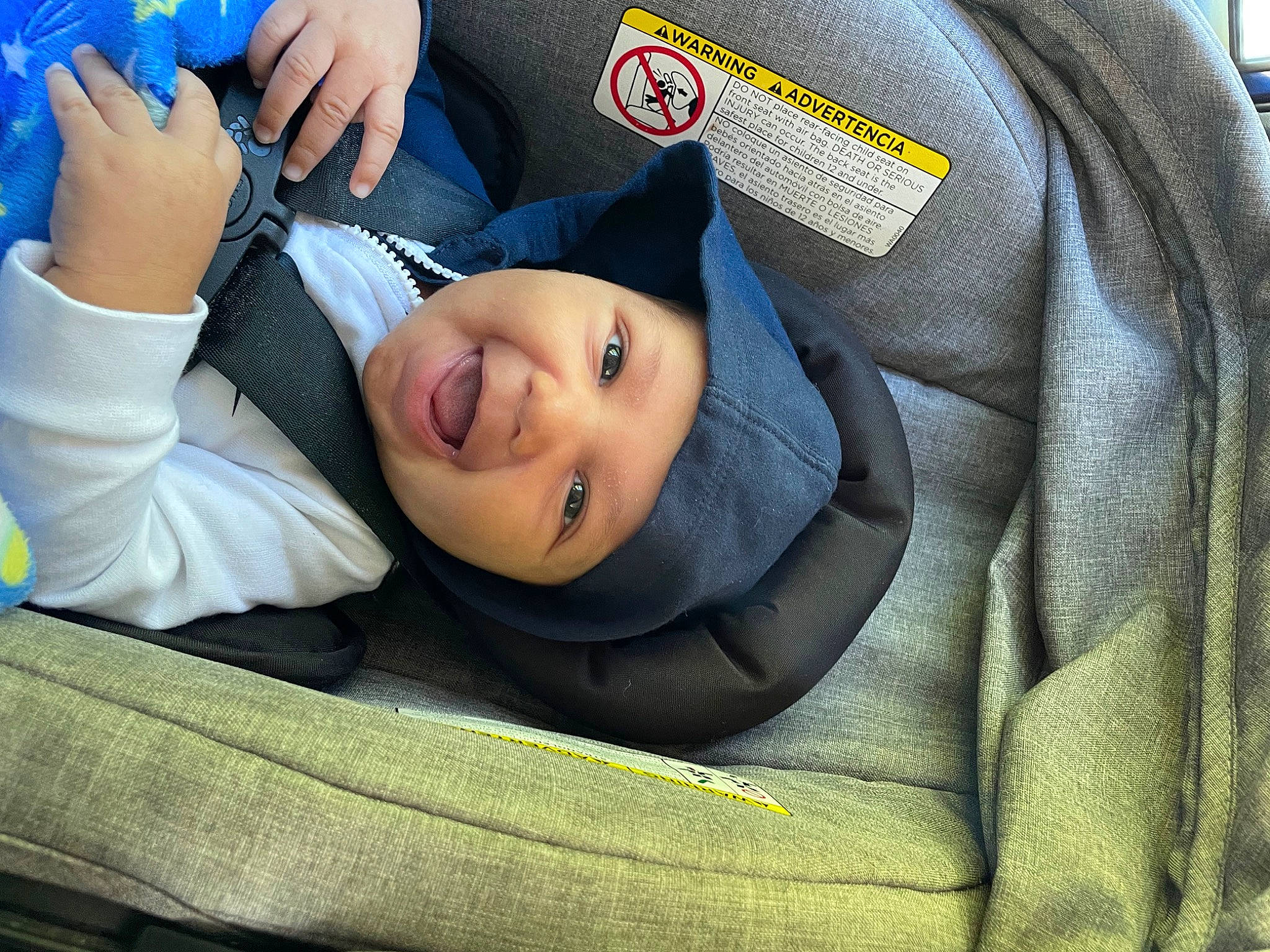 Julius joined the competition — help win amazing prizes! auto_part, baby_products, blue, car_seat, child, comfort, electric_blue, family_car, gesture, happy, head_restraint, headwear, leisure, motor_vehicle, person, plant, sitting, smile, suit, toddler