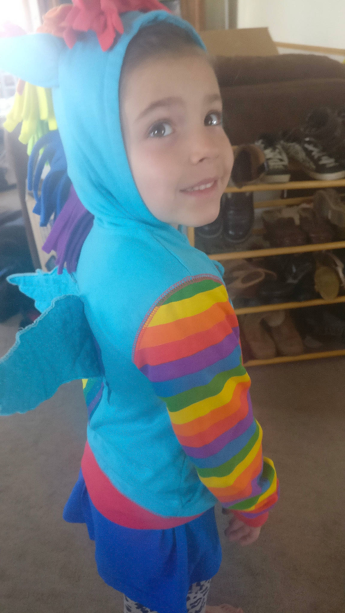 Helynn is registered to the contest to win money with this photo: blue, child, costume, electric_blue, fun, outerwear, person, play, smile, toddler