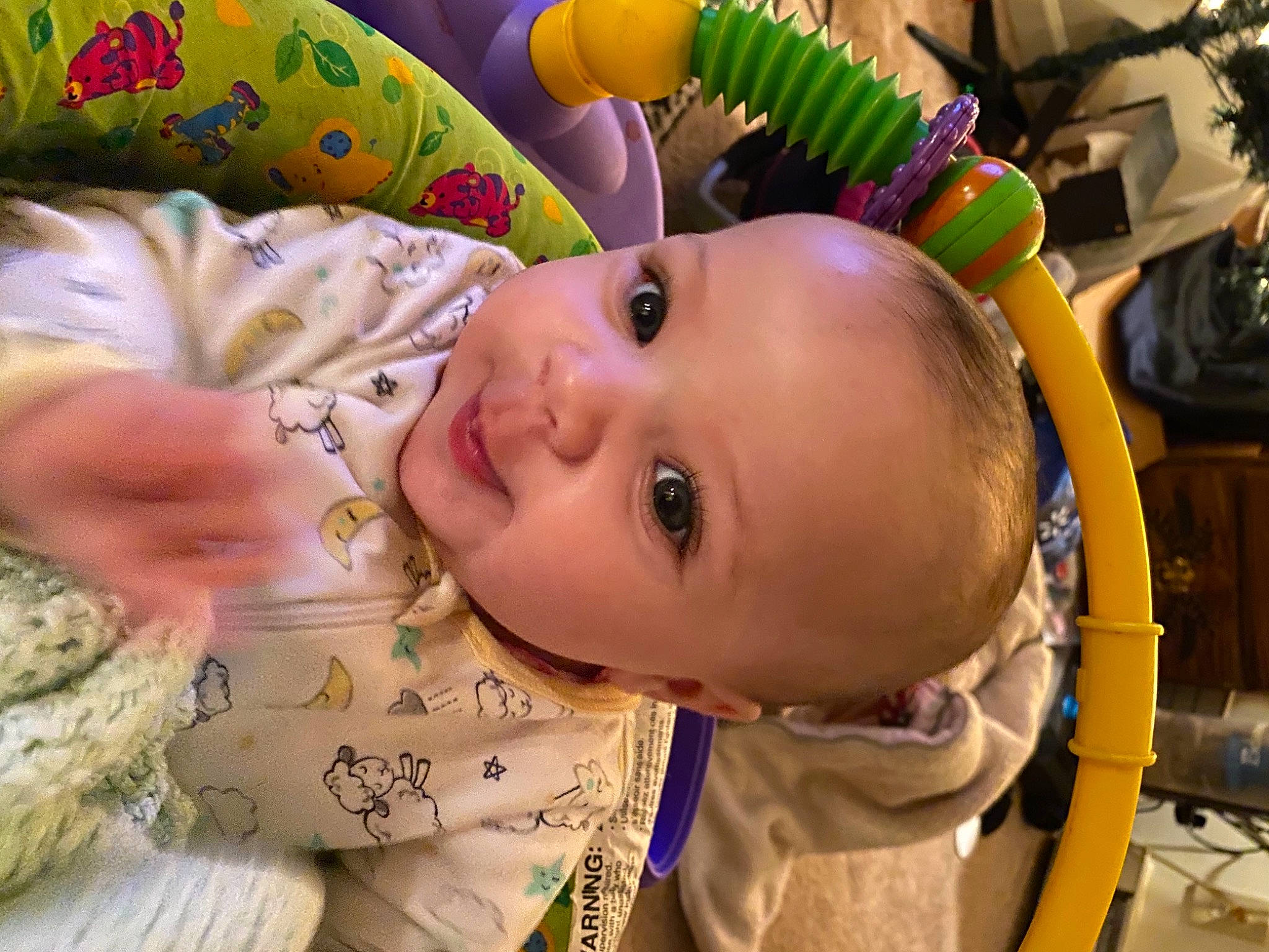 Diamond is registered to the contest to win money with this photo: baby, baby_products, baby_toddler_clothing, baby_toys, cheek, child, facial_expression, flowerpot, houseplant, person, toddler, yellow