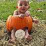 Bentley is registered to the contest to win money with this photo: autumn, baby, barefoot, celebration, child, cute, fall, grass, happy, hay, holiday, infant, nature, outdoor, portrait, pumpkin, seasonal, sign, six_months, smiling