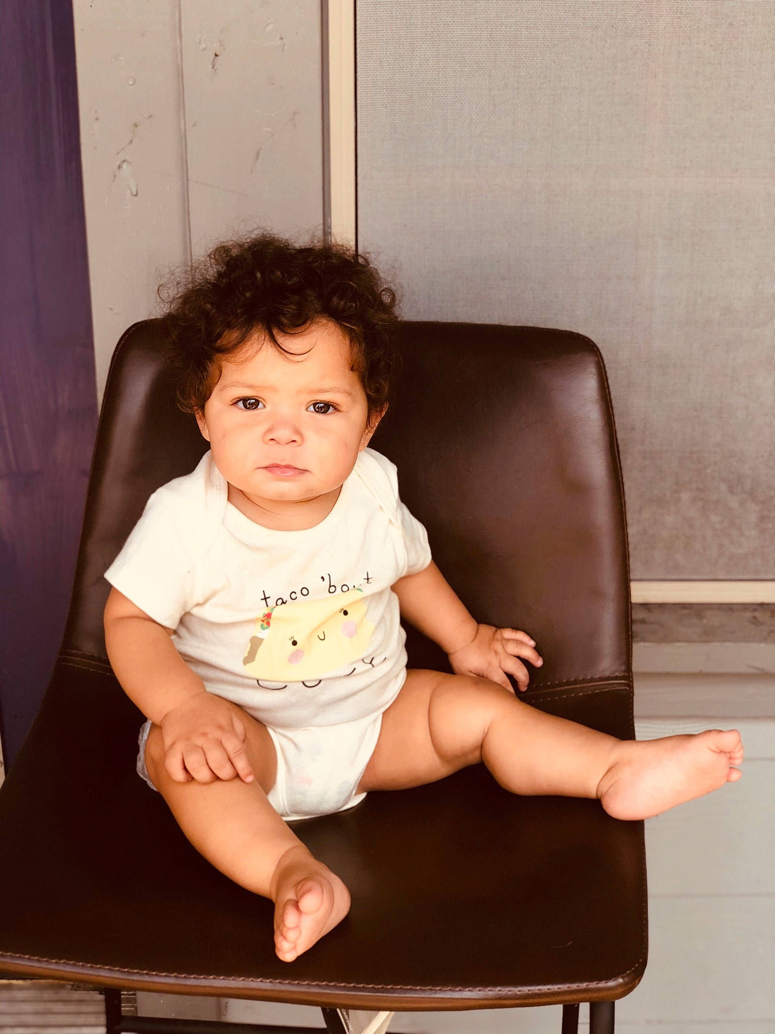 Maleah is registered to the contest to win money with this photo: ankle, baby_toddler_clothing, comfort, curtain, eye, finger, foot, hand, human_body, human_leg, joint, knee, lap, person, shoulder, sitting, skin, sock, toddler, toe