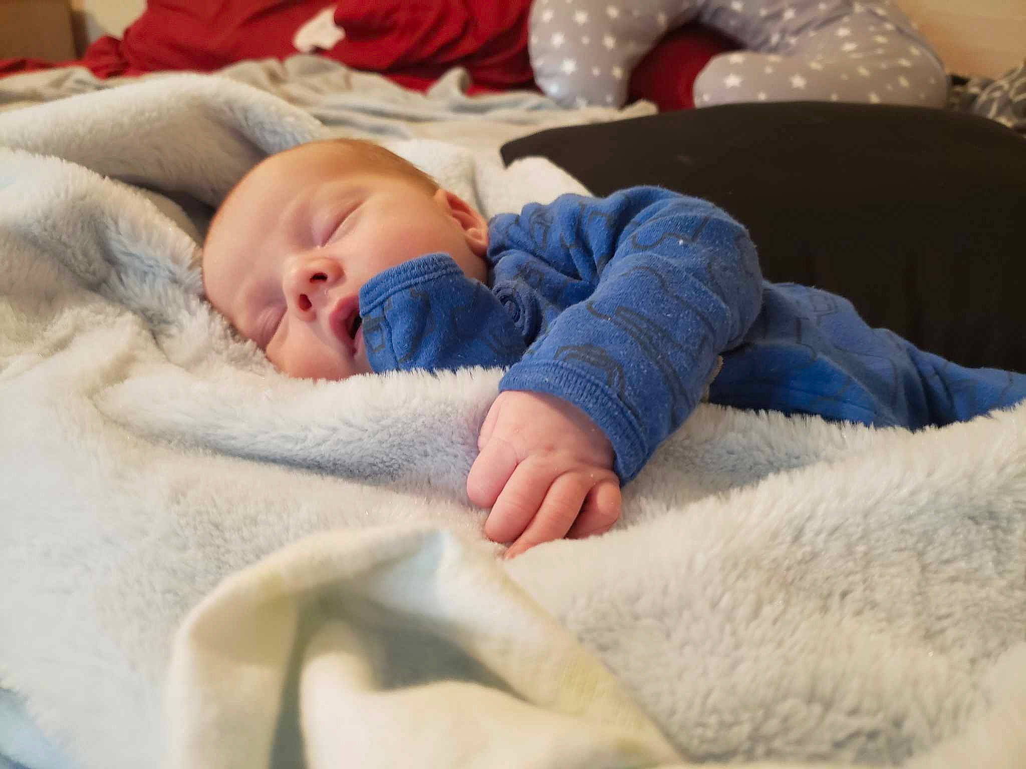 Joshua Jr joined the competition — help win amazing prizes! baby, baby_sleeping, baby_toddler_clothing, bedding, bedtime, cheek, child, comfort, couch, electric_blue, facial_expression, fur, linens, nap, person, portrait_photography, room, skin, sleep, toddler