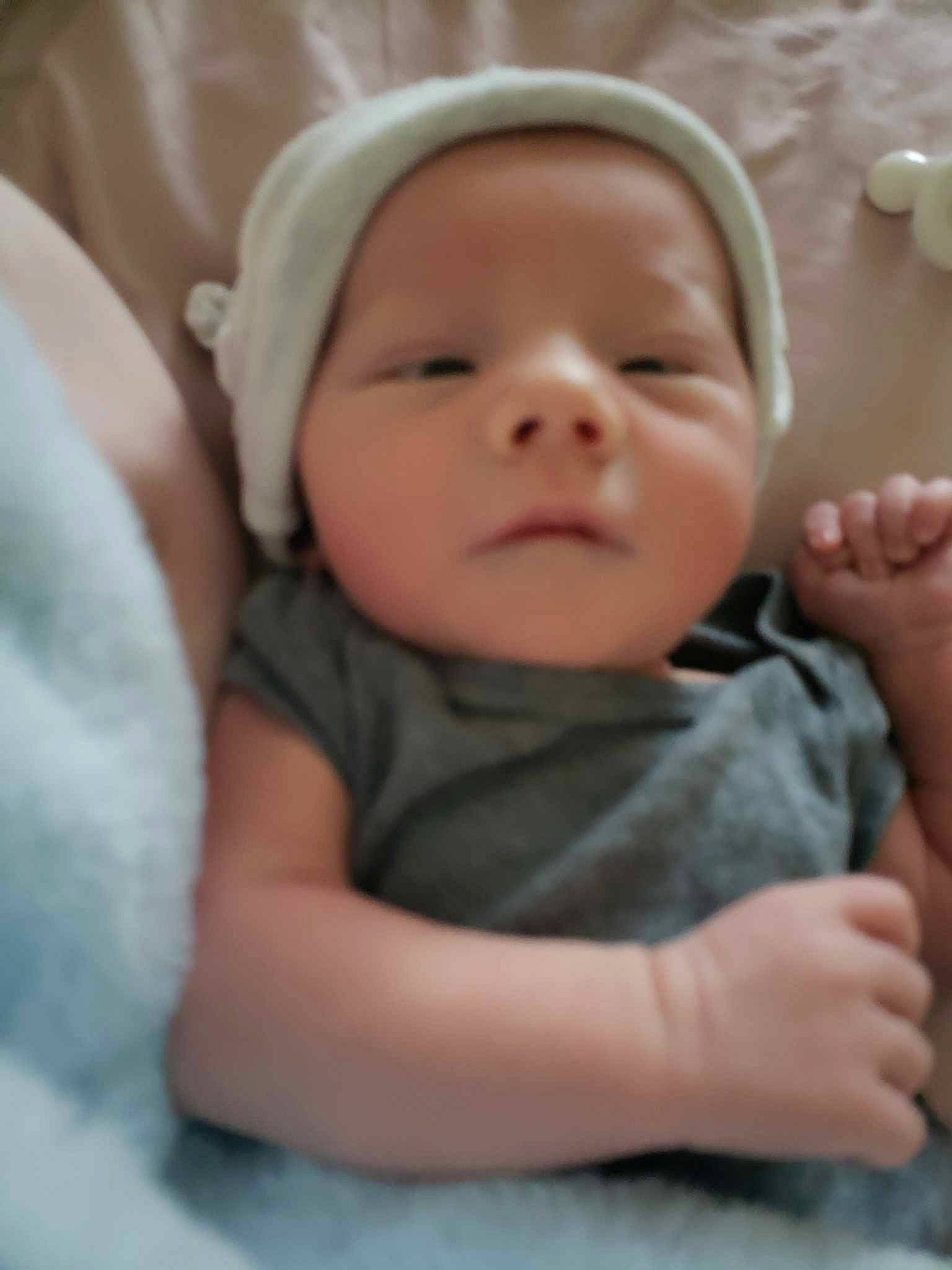 Joshua Jr is registered to the contest to win money with this photo: baby, baby_toddler_clothing, cheek, child, chin, close_up, comfort, eye, eyebrow, finger, gesture, happy, iris, lip, mouth, nose, person, skin, sleeve, thumb