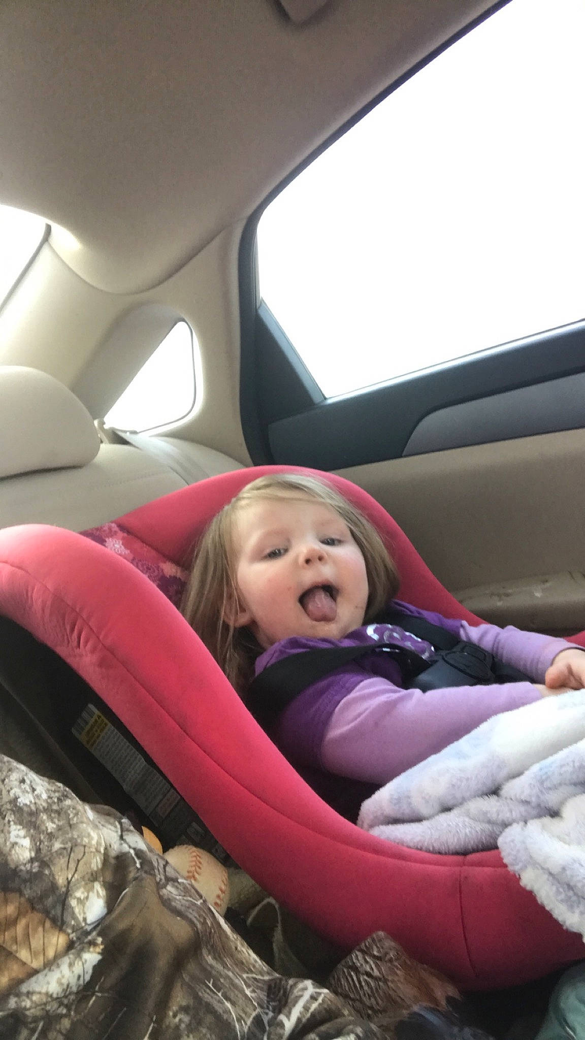 Novalee is registered to the contest to win money with this photo: auto_part, automotive_design, car, car_seat, car_seat_cover, child, comfort, driving, family_car, luxury_vehicle, mouth, person, vehicle, vehicle_door