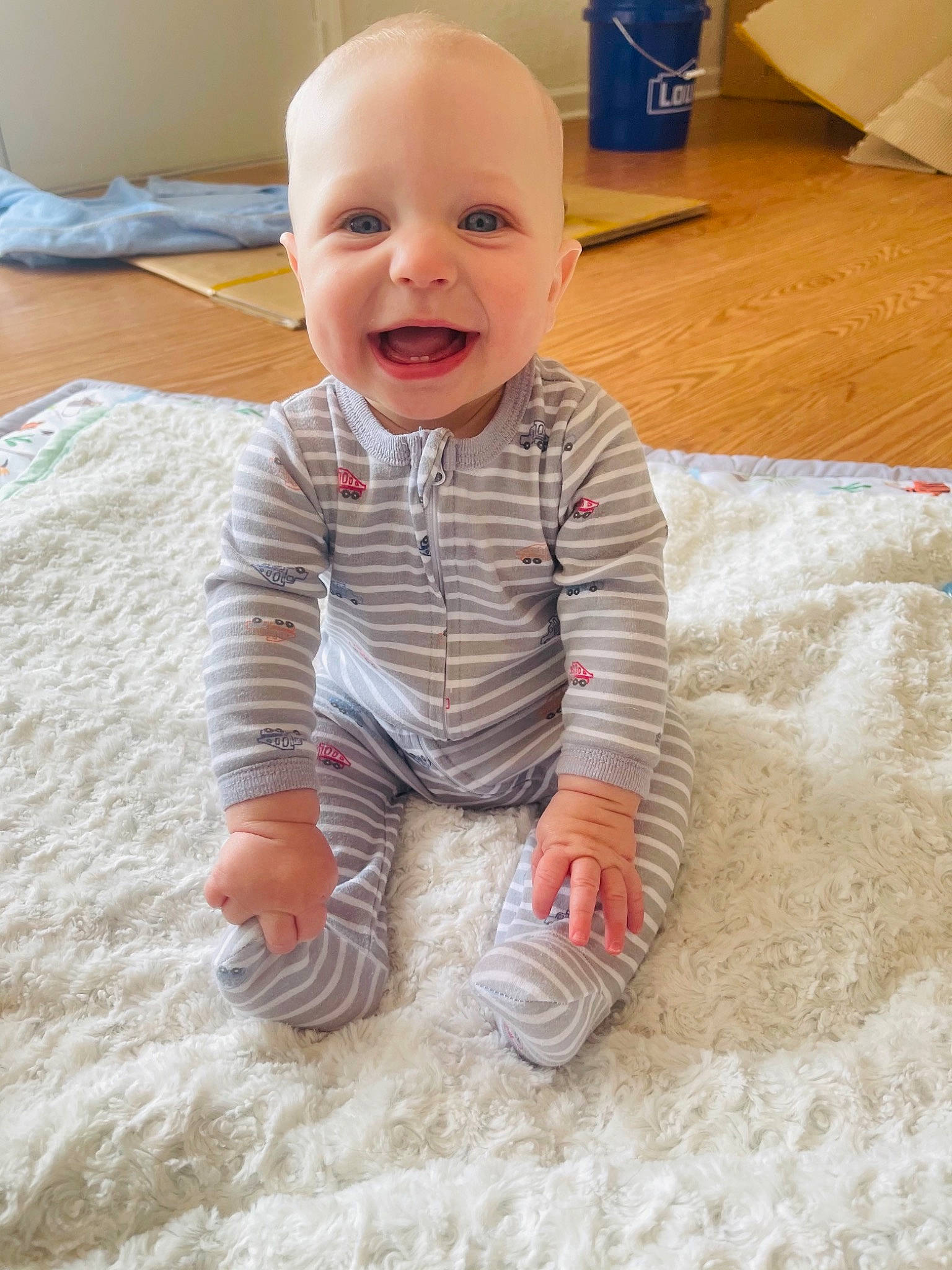 Mason joined the competition — help win amazing prizes! baby, baby_toddler_clothing, cheek, child, chin, comfort, eye, face, finger, floor, flooring, happy, hardwood, head, nose, person, skin, sleeve, smile, toddler