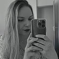 Justine L.
