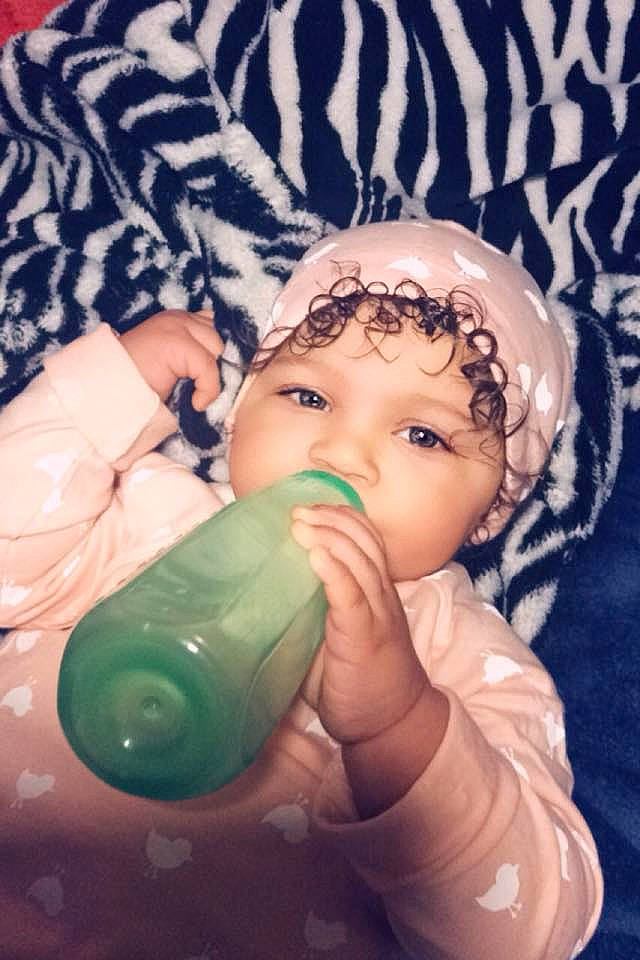 Adalee joined the competition — help win amazing prizes! baby, baby_products, bottle, cheek, child, drinkware, eye, face, forehead, green, head, headgear, headwear, person, product, tableware, toddler
