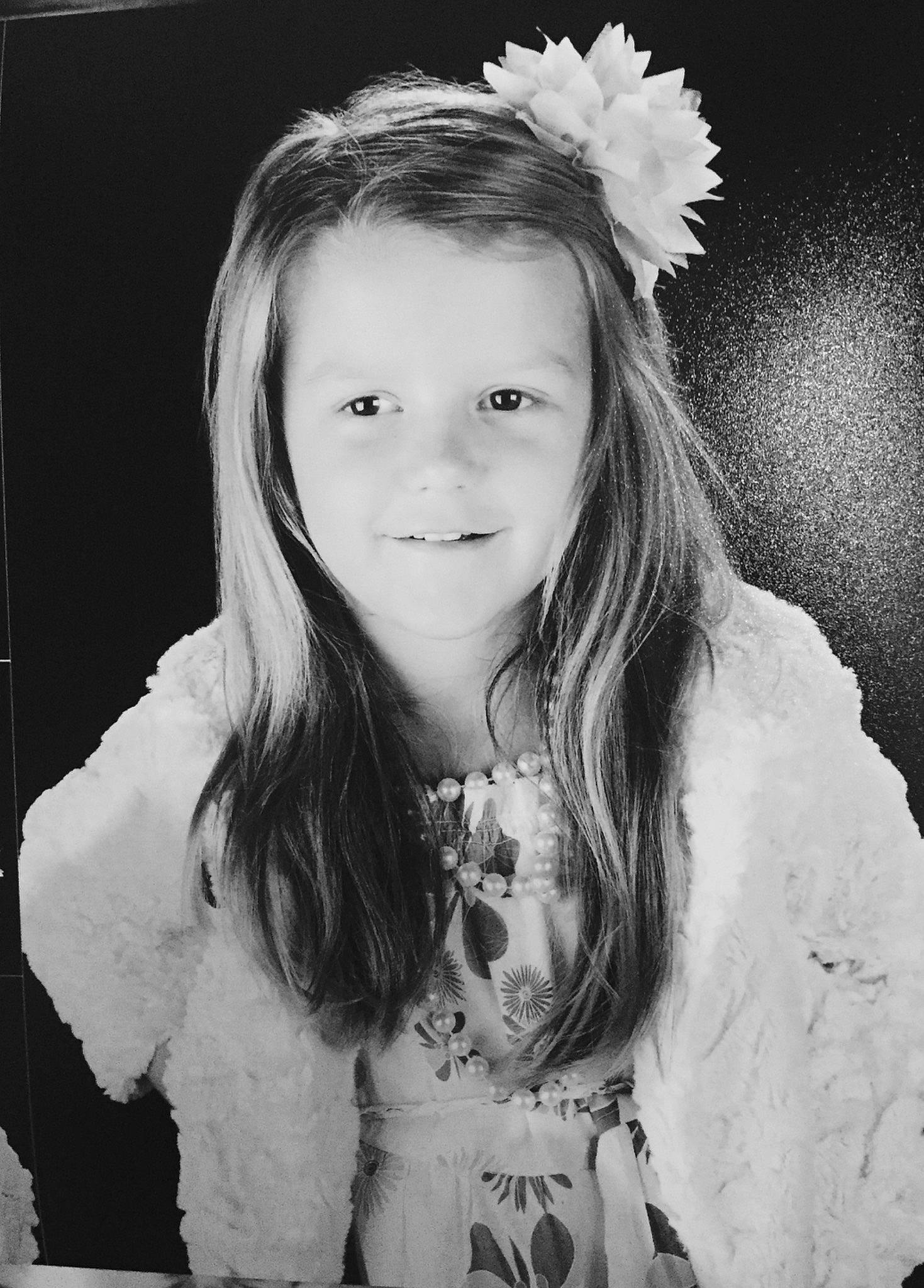 Lani joined the competition — help win amazing prizes! black_and_white, child, child_model, face, flash_photography, hair, hair_accessory, hairstyle, headpiece, iris, long_hair, monochrome, monochrome_photography, person, photo_shoot, photograph, photography, portrait, portrait_photography, smile