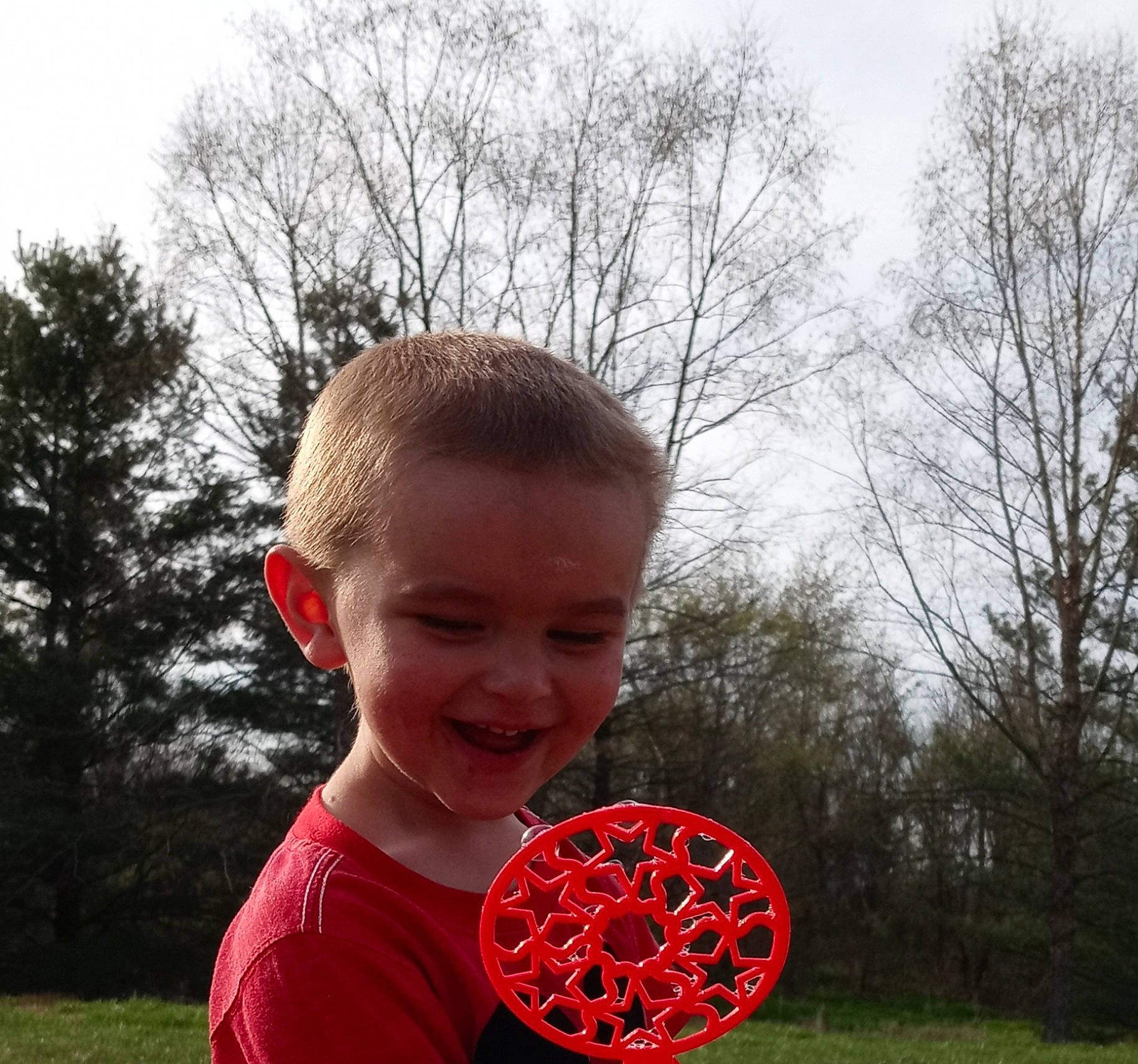 Andrew joined the competition — help win amazing prizes! auto_part, automotive_tire, automotive_wheel_system, carmine, electric_blue, fun, grass, happy, joy, leisure, party_supply, people_in_nature, person, plant, recreation, rim, sky, smile, t_shirt, toddler