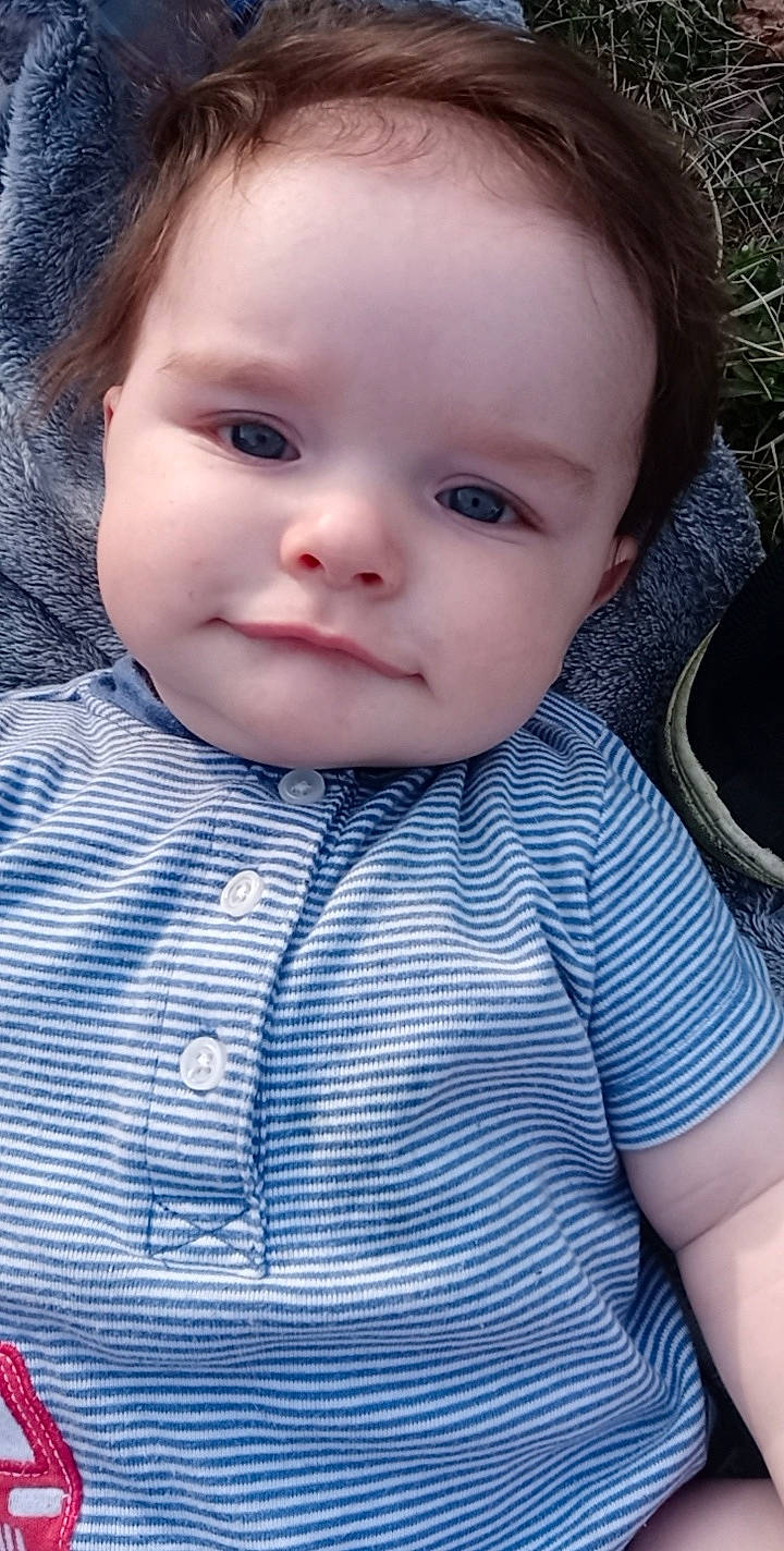 Kason joined the competition — help win amazing prizes! azure, baby, baby_toddler_clothing, cheek, child, electric_blue, eyebrow, eyelash, grass, human_body, iris, lip, mouth, nose, pattern, person, portrait_photography, skin, sleeve, t_shirt