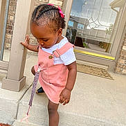 Zamari joined the competition — help win amazing prizes! adult, blackhair, car, child, clothing, cornrows, face, female, footwear, girl, hair, head, person, sandal, sitting, sleeve, student, transportation, vehicle, woman