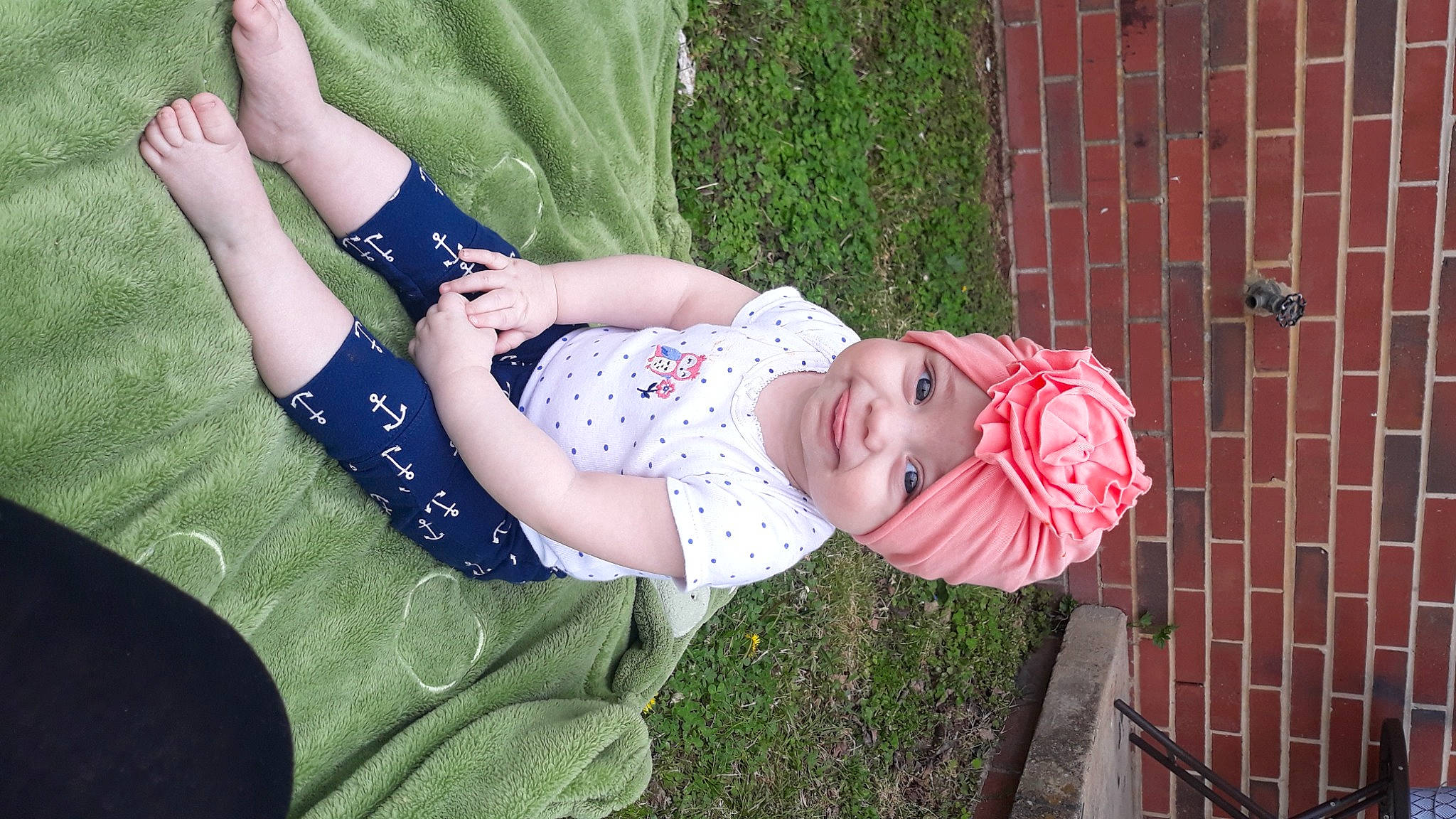 Syrenity is registered to the contest to win money with this photo: baby, baby_toddler_clothing, child, dress, eye, fun, grass, grass_family, green, happy, head, headwear, human_body, joy, leisure, people_in_nature, person, pink, plant, skin