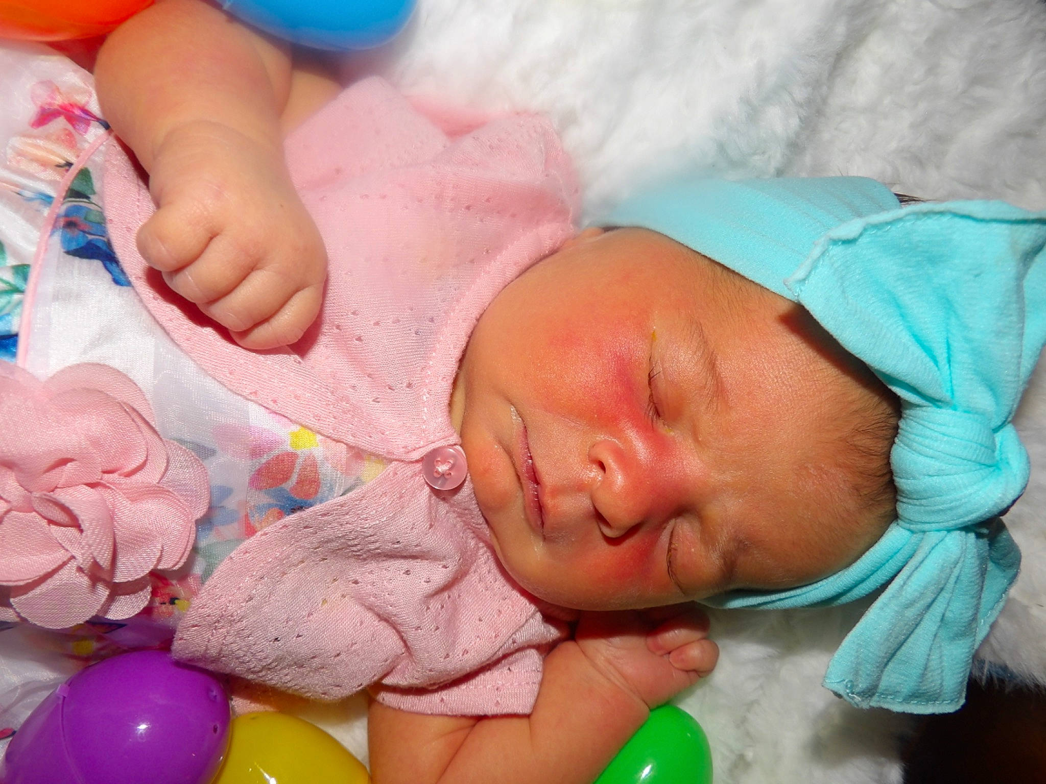 Daphne is registered to the contest to win money with this photo: baby, baby_products, baby_toddler_clothing, bedtime, blue, cheek, child, comfort, event, finger, head, linens, mouth, nail, person, pink, product, skin, textile, thumb