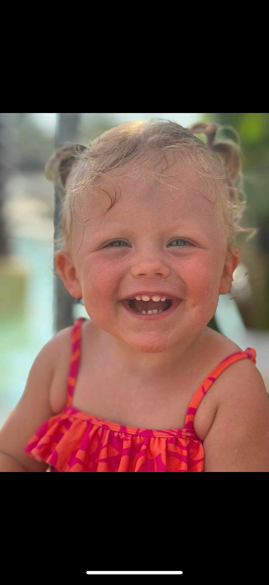 Romy a rejoint le concours — aidez-le/la à gagner de superbes lots ! child, toddler, smiling, curly_hair, pigtails, dress, orange, pink, outdoor, portrait, happy, face, person, cute, baby, summer, sunlight, closeup, skin, young
