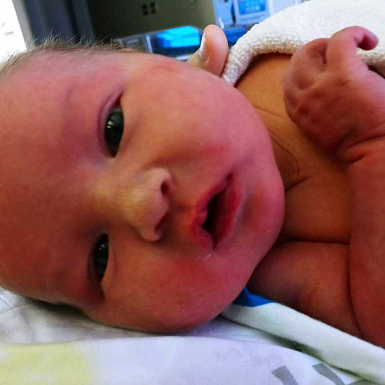 Jagger is registered to the contest to win money with this photo: baby, cheek, chin, ear, eye, eyebrow, eyelash, finger, forehead, gesture, happy, iris, lip, mouth, neck, nose, skin, smile, thumb, toddler