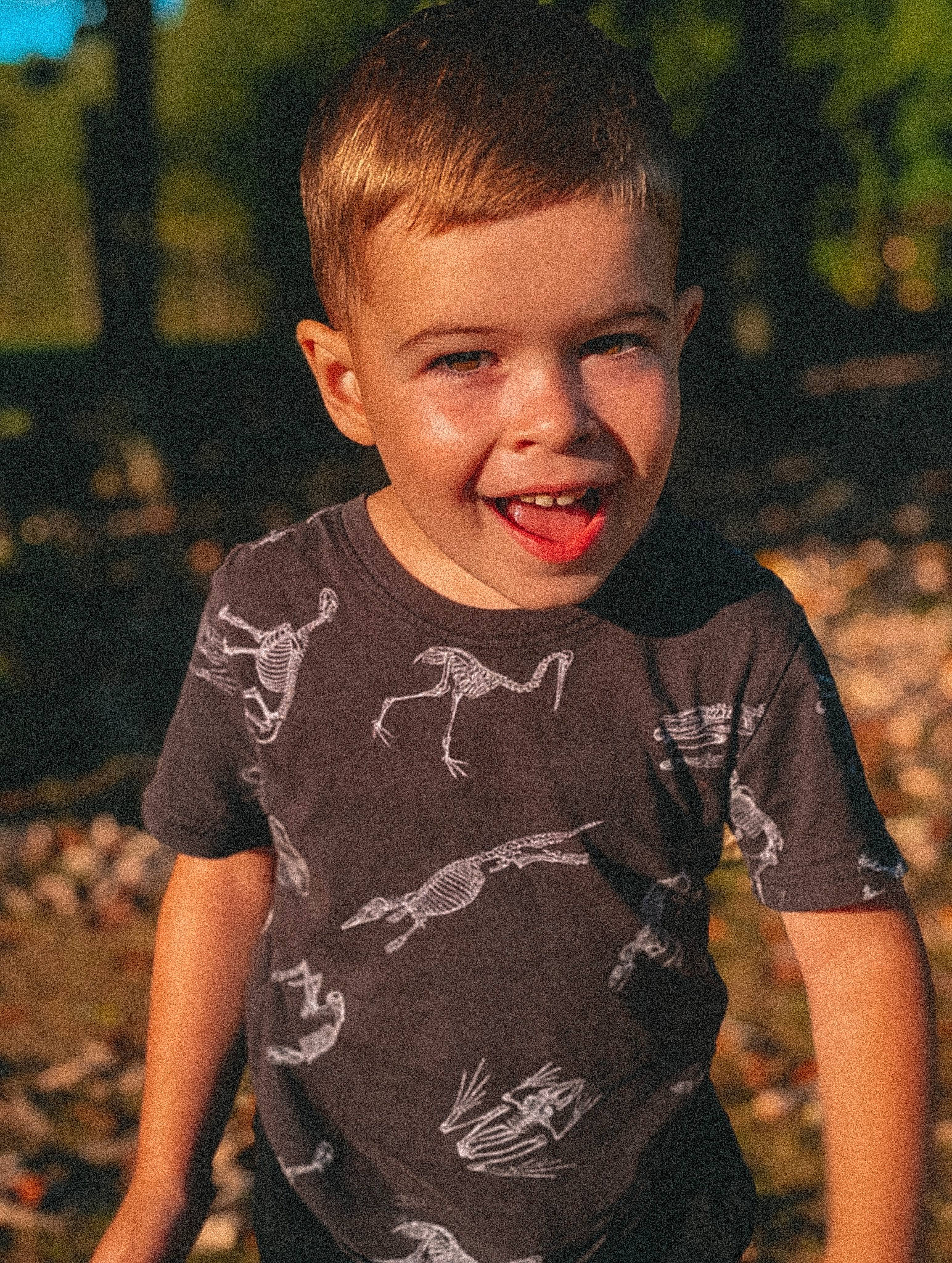Danylo is registered to the contest to win money with this photo: adaptation, baby, baby_toddler_clothing, cheek, cool, facial_expression, flash_photography, grass, happy, iris, joy, lip, nose, people_in_nature, person, skin, sleeve, smile, standing, t_shirt
