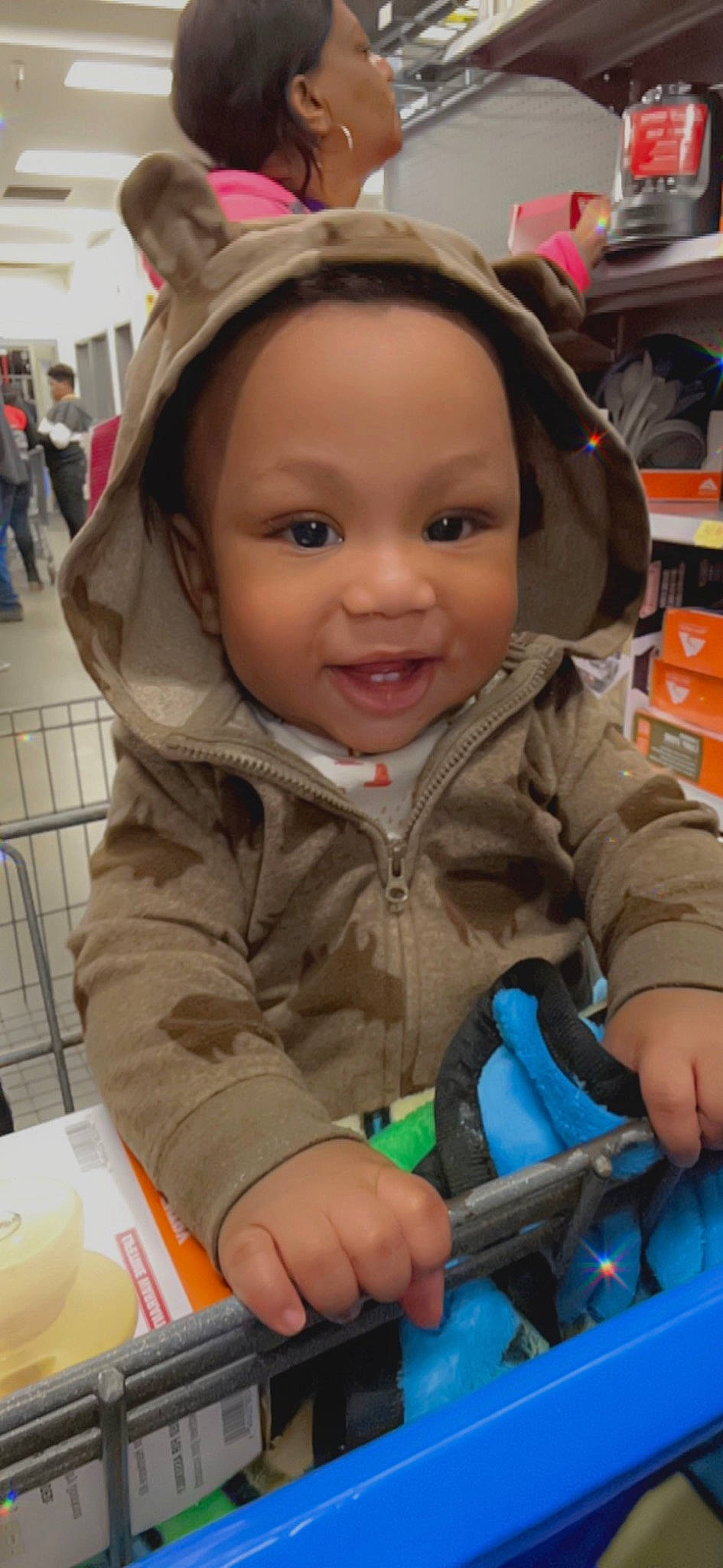 Jayden is registered to the contest to win money with this photo: baby, blurred, cap, cheek, child, comfort, customer, fun, happy, iris, leisure, organ, outerwear, people, person, photograph, sitting, skin, smile, snapshot