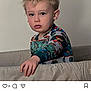 Reuben joined the competition — help win amazing prizes! blonde_hair, casual, child, colorful_clothing, curious, cushion, expression, face, hand, home, indoor, light, looking, neutral_background, patterned_shirt, person, portrait, seated, toddler, young_child
