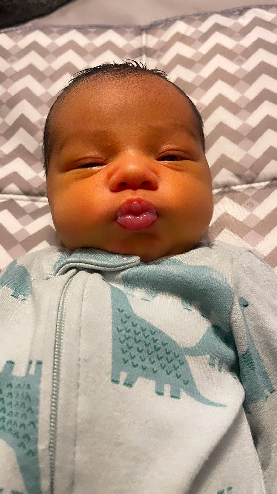 Andrés joined the competition — help win amazing prizes! baby, baby_products, baby_sleeping, baby_toddler_clothing, bedding, bedtime, cheek, child, comfort, eyelash, happy, linens, neck, nose, pattern, person, room, skin, sleeve, smile