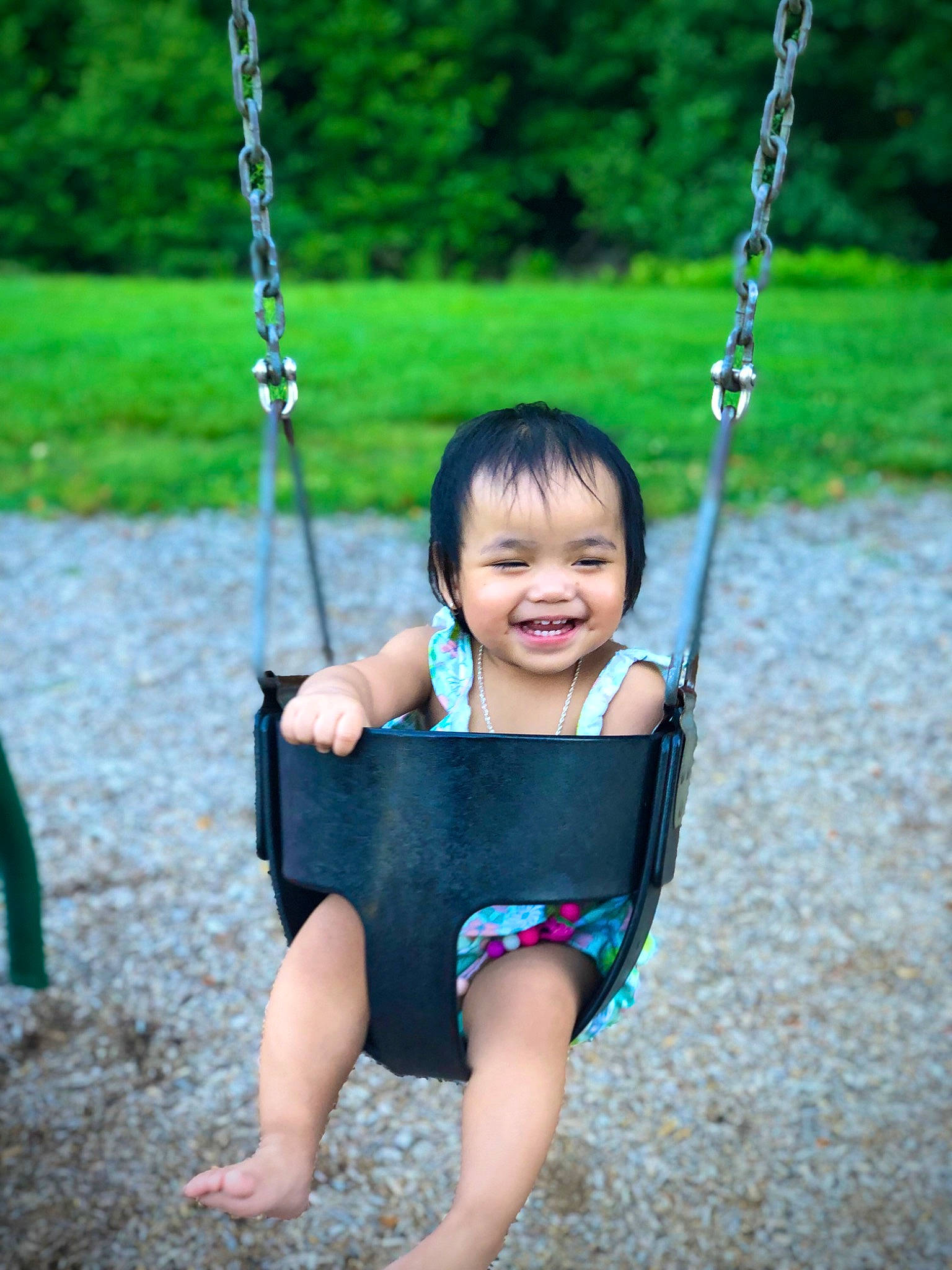 Alina joined the competition — help win amazing prizes! arm, black, eye, face, facial_expression, grass, green, hand, happy, head, joy, natural_environment, nature, person, photograph, plant, product, smile, standing, swing