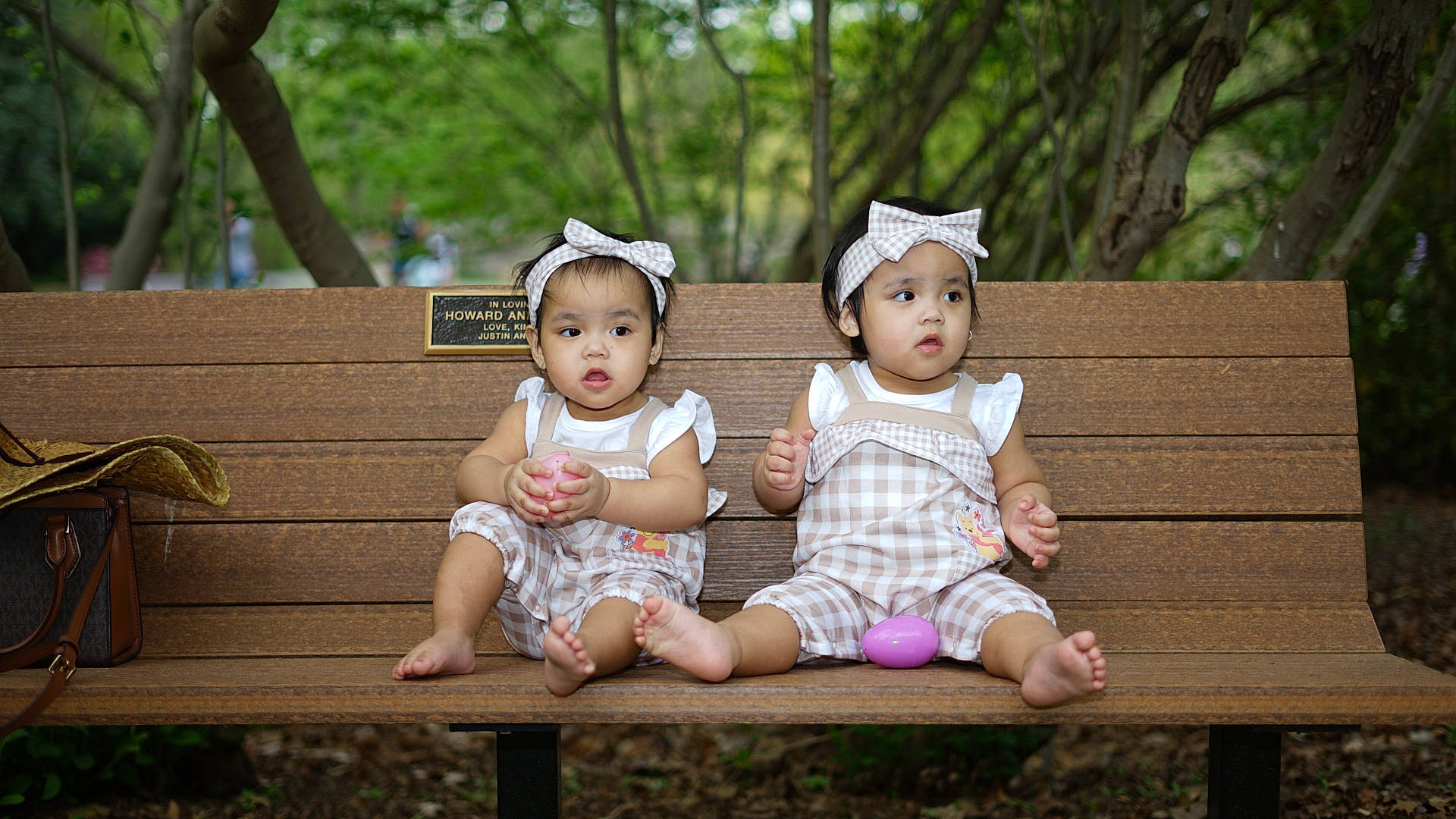 Amina is registered to the contest to win money with this photo: baby, baby_toddler_clothing, child, doll, dress, eye, foot, fun, grass, happy, headwear, leg, leisure, people_in_nature, person, portrait_photography, sitting, skin, toddler, toy