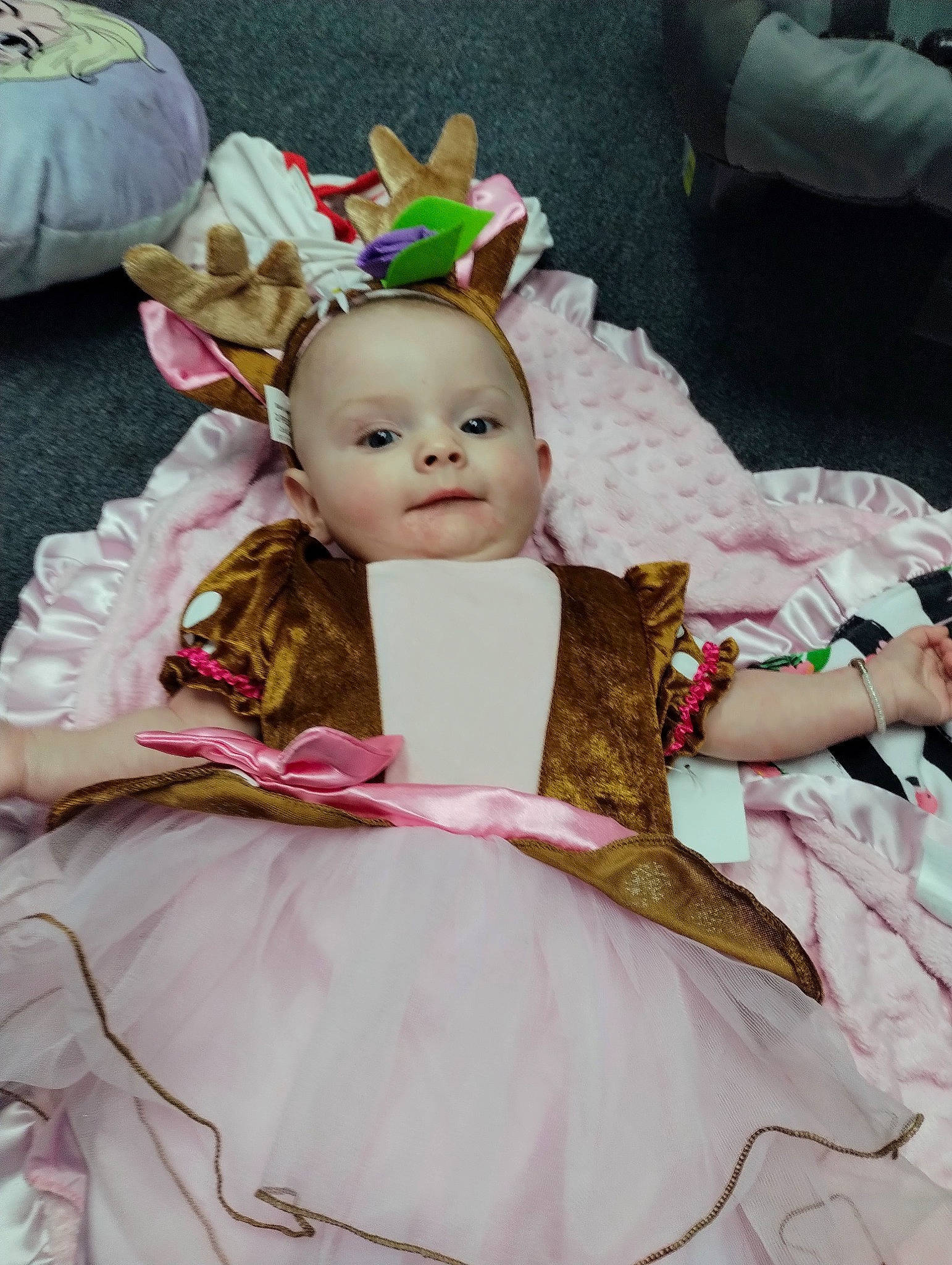 Mckenzie joined the competition — help win amazing prizes! baby, baby_products, baby_toddler_clothing, cheek, child, costume, event, eye, fashion_accessory, fun, hair_accessory, happy, headpiece, iris, linens, person, pink, sitting, skin, toddler