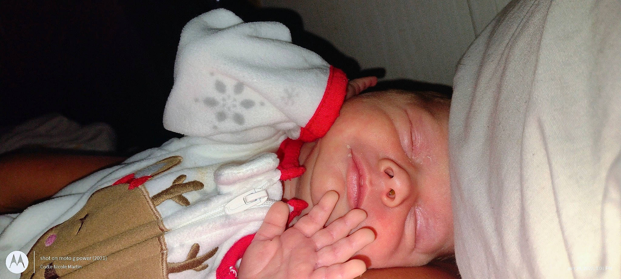 Mckenzie is registered to the contest to win money with this photo: arm, baby, cheek, comfort, eyebrow, eyelash, finger, gesture, hand, happy, human_body, lip, mouth, nail, neck, nose, person, skin, thumb, toddler