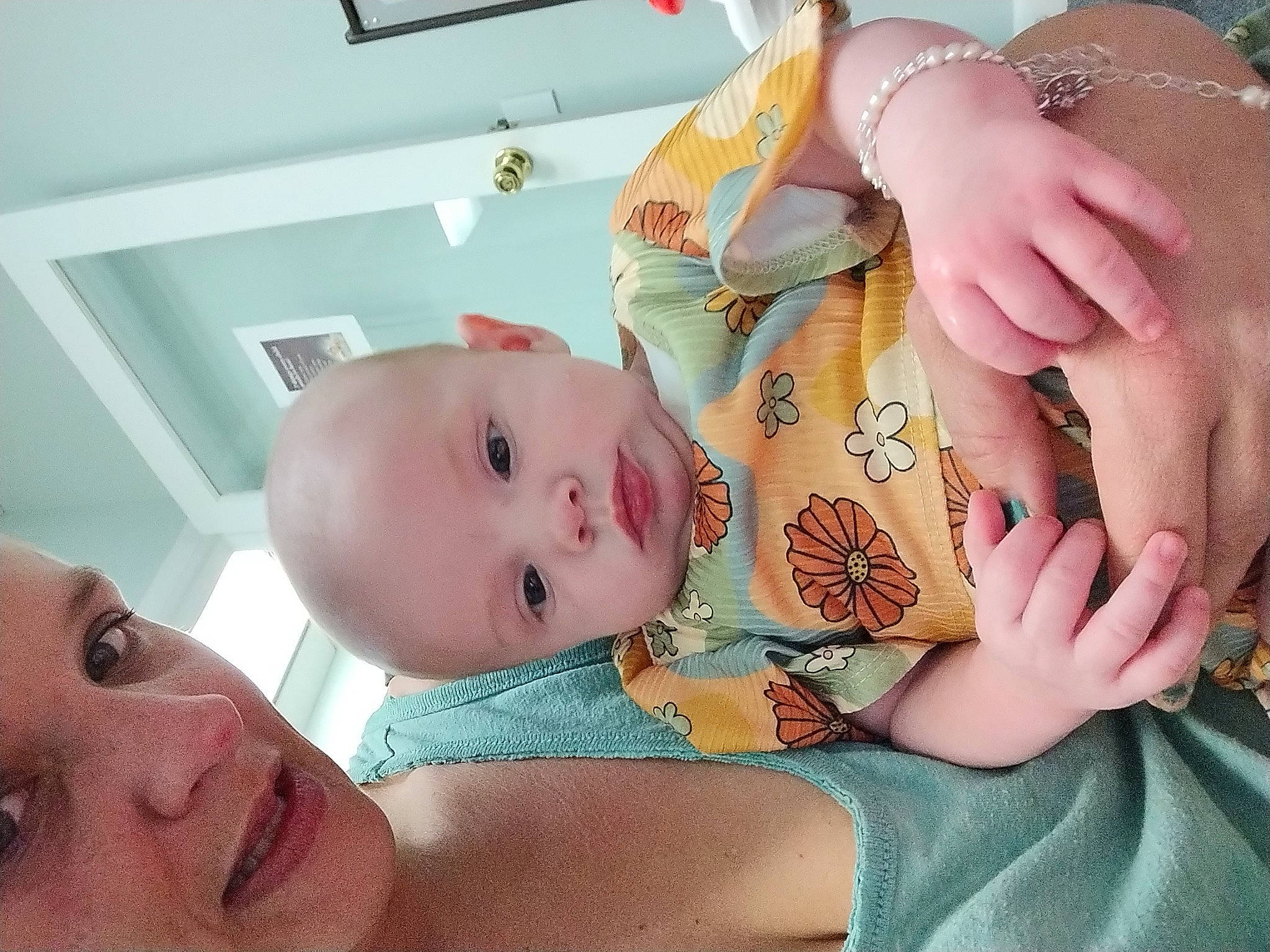 Angelina is registered to the contest to win money with this photo: baby, baby_products, baby_toddler_clothing, cheek, child, comfort, eyelash, finger, gesture, hand, head, mouth, nail, neck, nose, person, skin, smile, textile, thumb