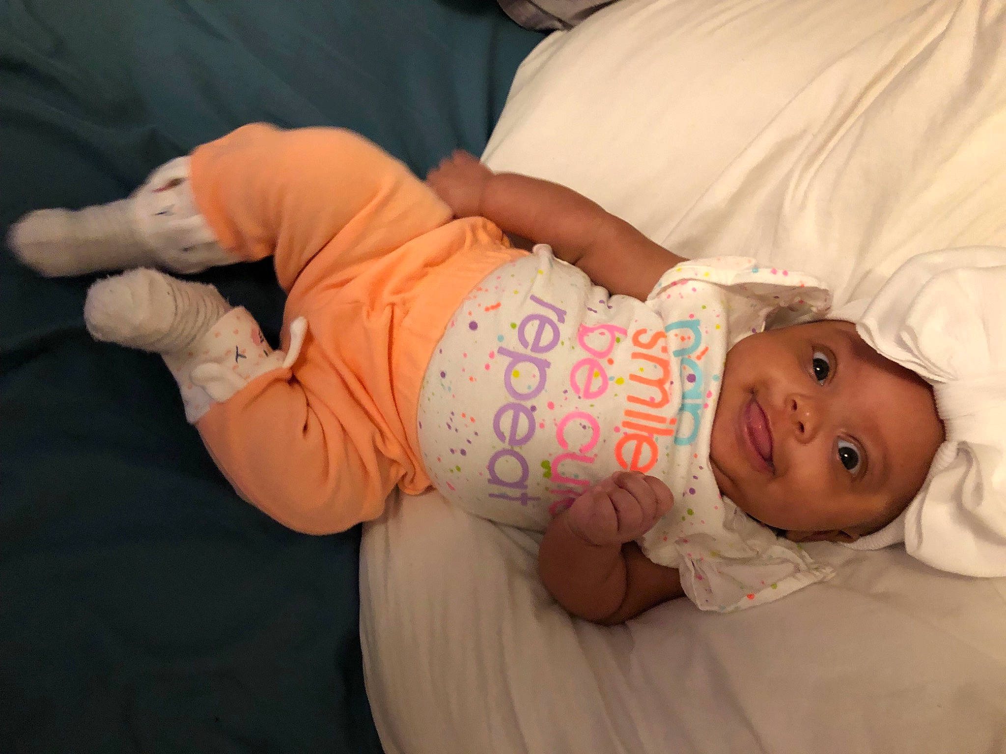 Isla joined the competition — help win amazing prizes! abdomen, baby, baby_products, baby_toddler_clothing, cheek, child, comfort, elbow, finger, headgear, headwear, human_body, mammal, mouth, person, sitting, skin, sleeve, stomach, toddler