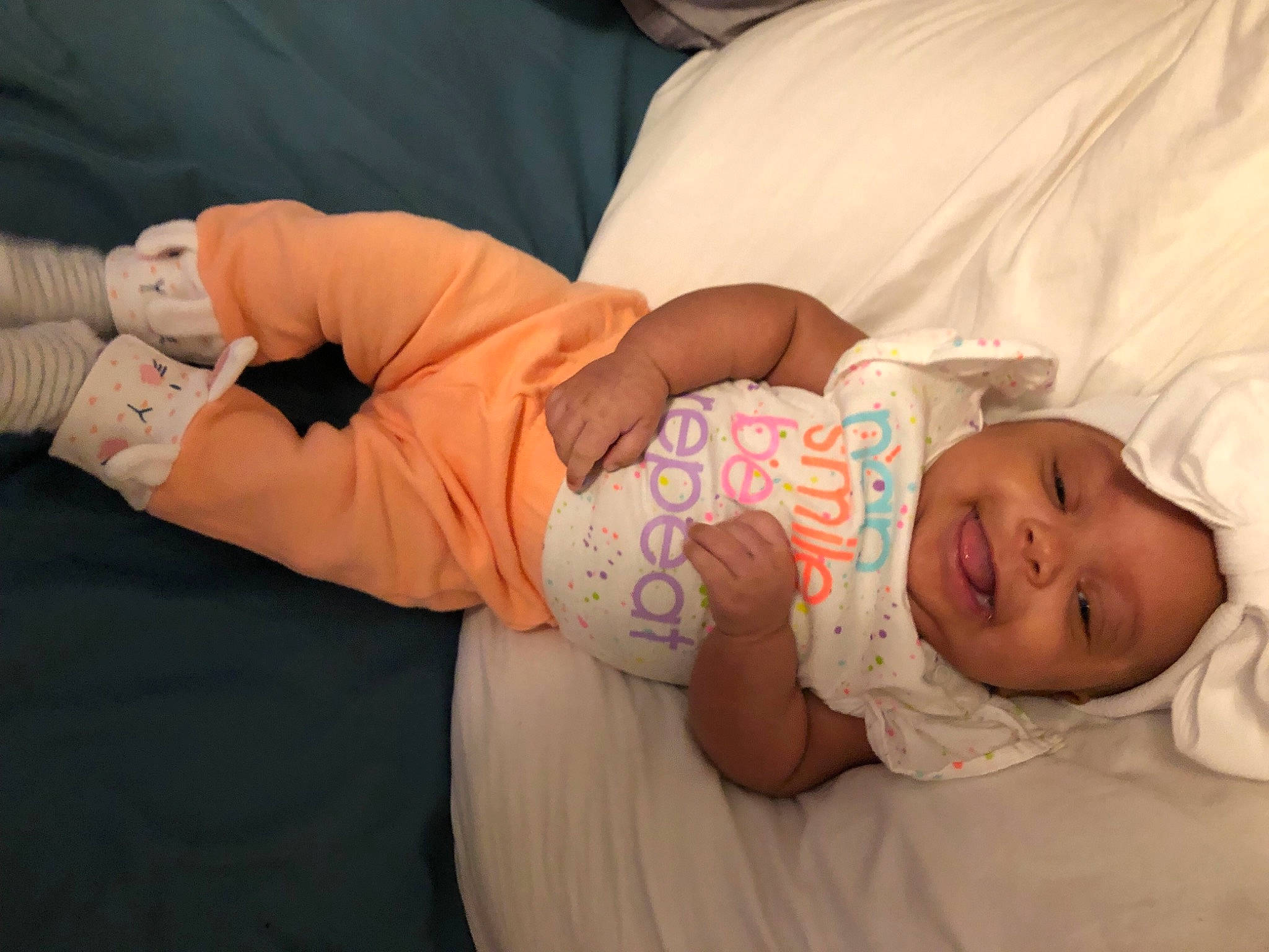 Isla joined the competition — help win amazing prizes! arm, baby, baby_toddler_clothing, comfort, elbow, eye, finger, glasses, hand, human_body, knee, leg, mammal, mouth, muscle, person, skin, smile, textile, toddler