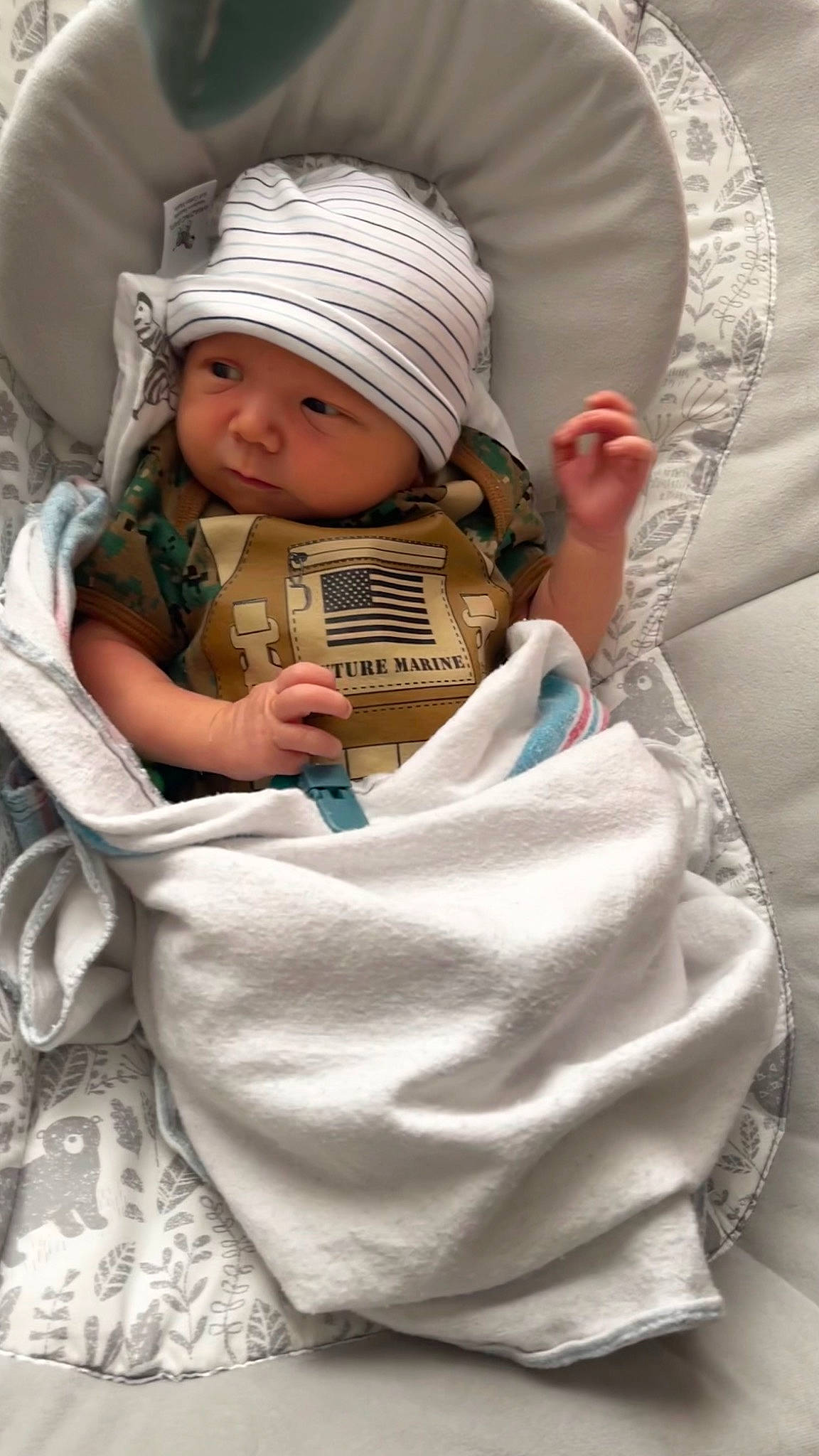 Ej is registered to the contest to win money with this photo: baby, baby_carriage, baby_products, baby_sleeping, baby_toddler_clothing, cap, child, comfort, eyelash, fashion_accessory, finger, happy, headwear, knit_cap, linens, nail, person, sitting, skin, sleeve