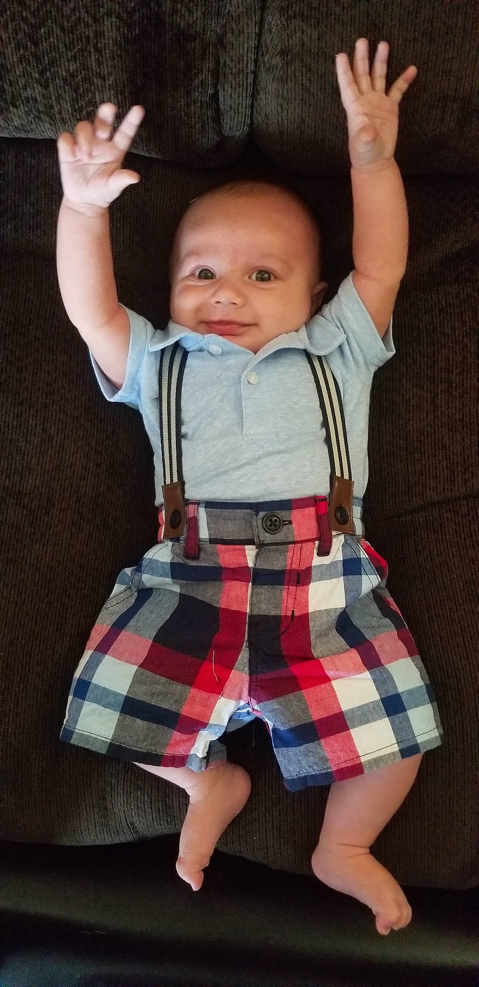 Keaton is registered to the contest to win money with this photo: arm, baby, child, child_model, clothing, design, joy, pattern, person, plaid, tartan, textile, toddler