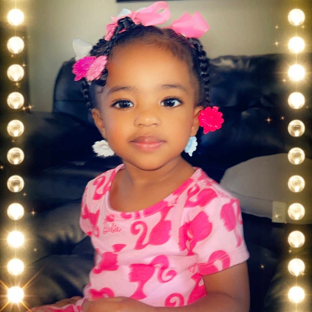 Hartley is registered to the contest to win money with this photo: accessories, appliance, baby, bodypart, ceilingfan, clothing, device, dress, electricaldevice, face, finger, hand, happy, head, indoors, lighting, person, photography, portrait, smile