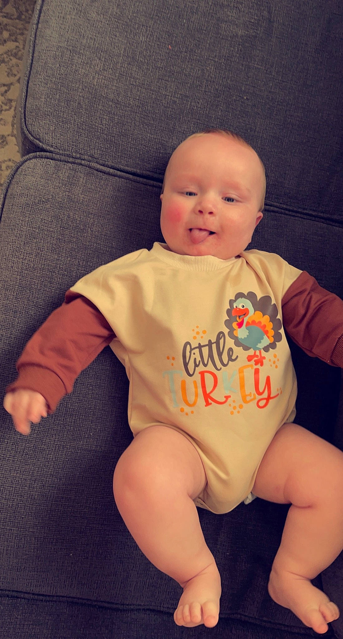 Waylon is registered to the contest to win money with this photo: baby, baby_toddler_clothing, cheek, chin, eye, face, happy, head, human_body, joint, knee, leg, mouth, neck, nose, person, skin, sleeve, smile, stomach