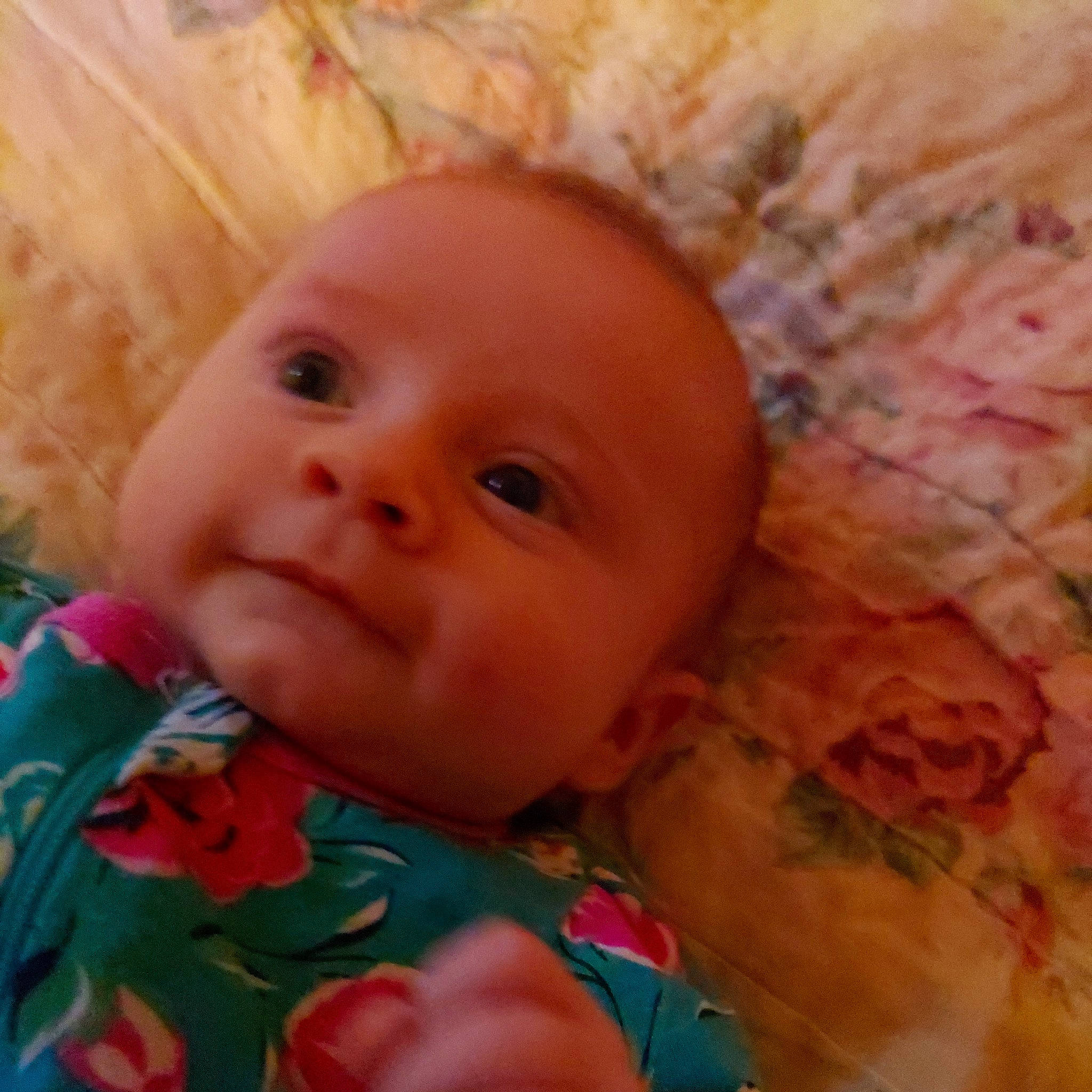 Kylee is registered to the contest to win money with this photo: baby, cheek, chin, close_up, eye, eyebrow, eyelash, face, happy, head, iris, lip, mouth, nose, people_in_nature, person, pink, skin, smile, textile