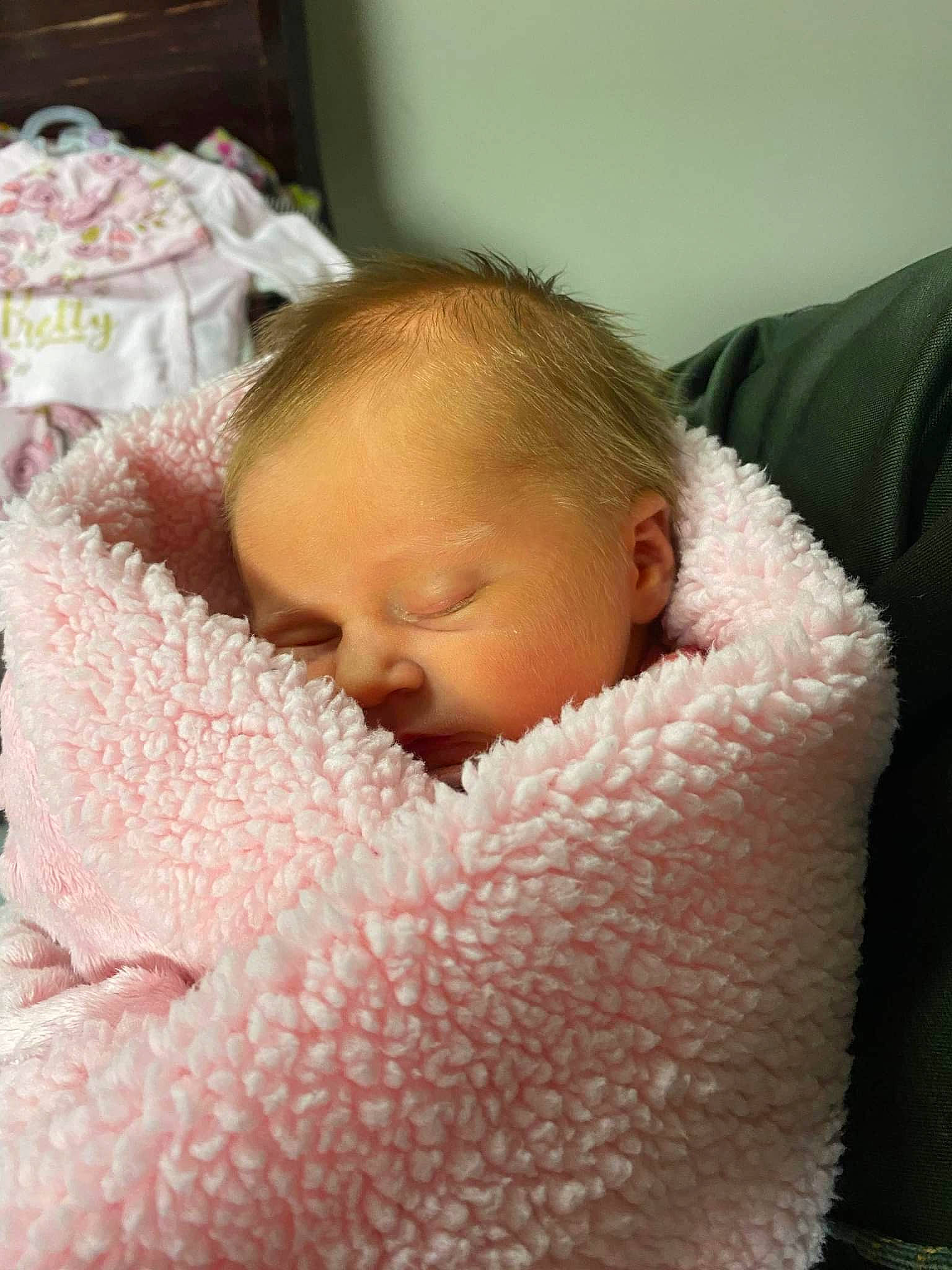 Kylee is registered to the contest to win money with this photo: baby, baby_products, baby_sleeping, baby_toddler_clothing, bedding, bedtime, cheek, child, comfort, eyelash, linens, lip, nap, nose, person, petal, pink, room, skin, textile