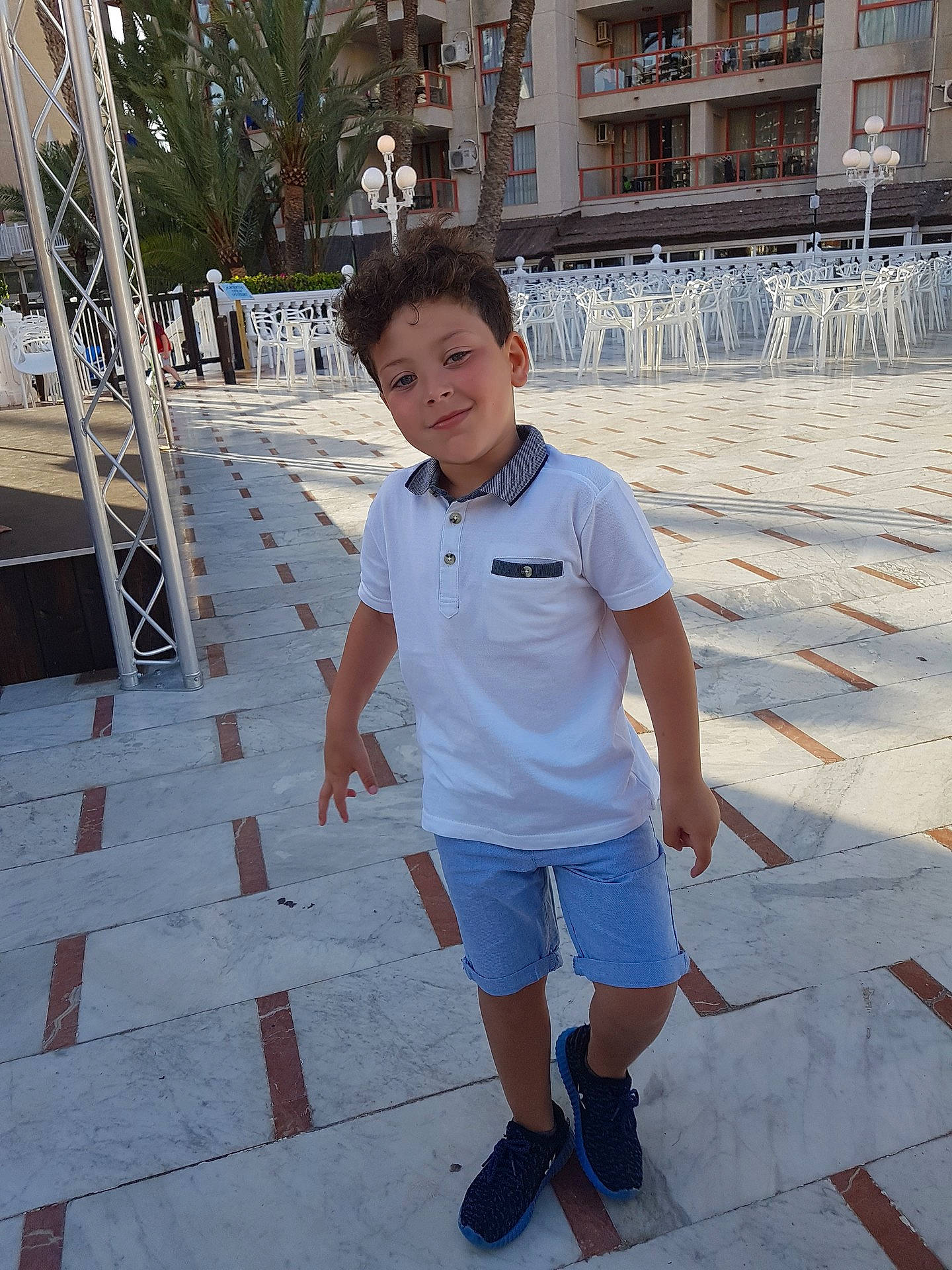 Kai is registered to the contest to win money with this photo: boy, child, cool, day, fun, girl, leisure, male, people, person, recreation, shorts, smile, snapshot, standing, tourism, travel, vacation, water