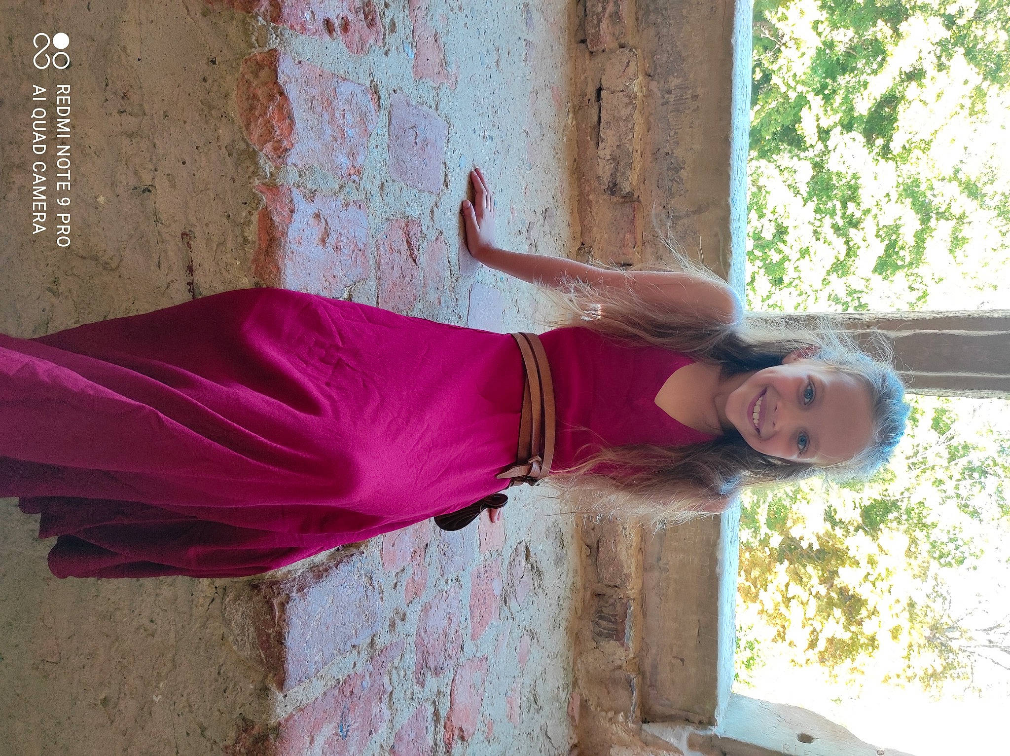 Lynna participe au concours pour gagner de l'argent avec cette photo : dress, fashion_design, formal_wear, fun, human_leg, joy, leisure, linens, magenta, pattern, person, pink, plant, purple, red, sleeve, smile, t_shirt, tree, waist