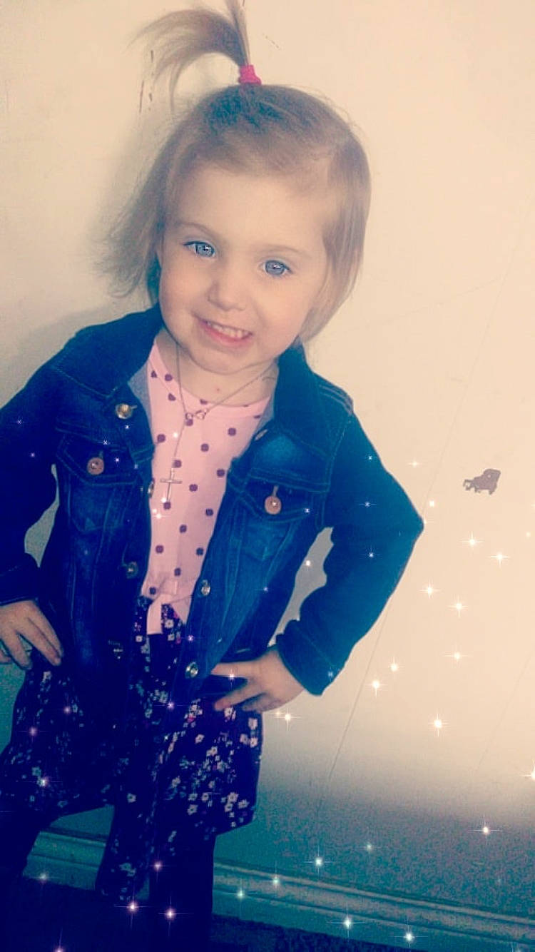 Bryleigh is registered to the contest to win money with this photo: blond, blue, cheek, child, child_model, cool, eye, face, forehead, fun, hair, hairstyle, head, iris, jacket, joy, long_hair, outerwear, person, smile