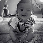 Loan a rejoint le concours — aidez-le/la à gagner de superbes lots ! arms, baby, blanket, child, closeup, crawling, cute, face, hands, happy, head, indoor, infant, monochrome, playtime, portrait, smiling, soft_texture, striped_bib, young