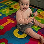 Brayden joined the competition — help win amazing prizes! baby, child, colorful, cute, face, floor, foot, hand, happy, indoors, infant, person, playmat, playtime, shorts, sitting, skin, smiling, toy, young