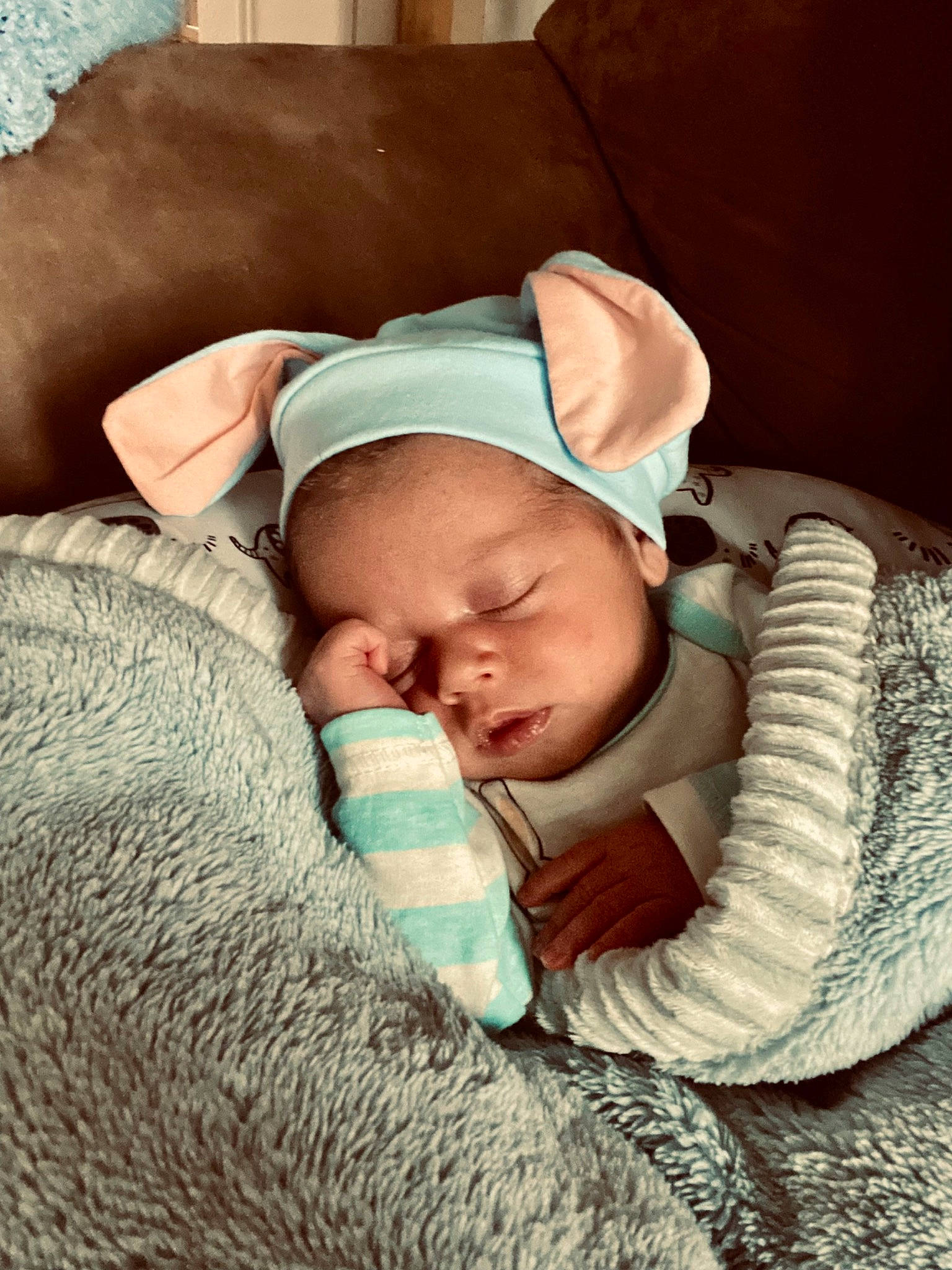 Judson is registered to the contest to win money with this photo: baby, baby_sleeping, baby_toddler_clothing, beanie, bedtime, cap, cheek, child, comfort, eye, face, knit_cap, linens, mouth, nap, nose, person, skin, toddler, wood