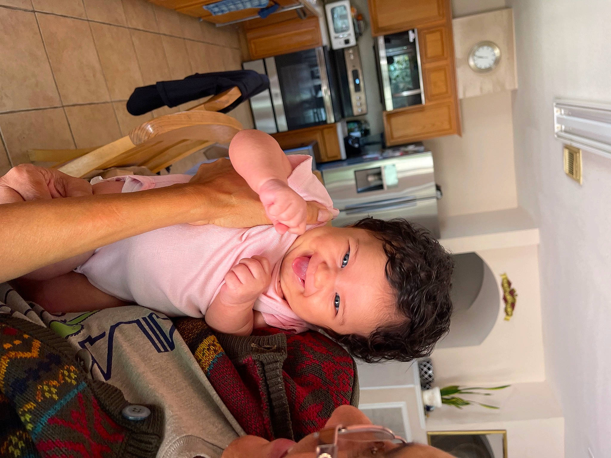 Mia joined the competition — help win amazing prizes! abdomen, baby, chest, child, comfort, cooking, elbow, fun, hat, home_appliance, human_leg, kitchen_appliance, person, room, thigh, toddler, wrist