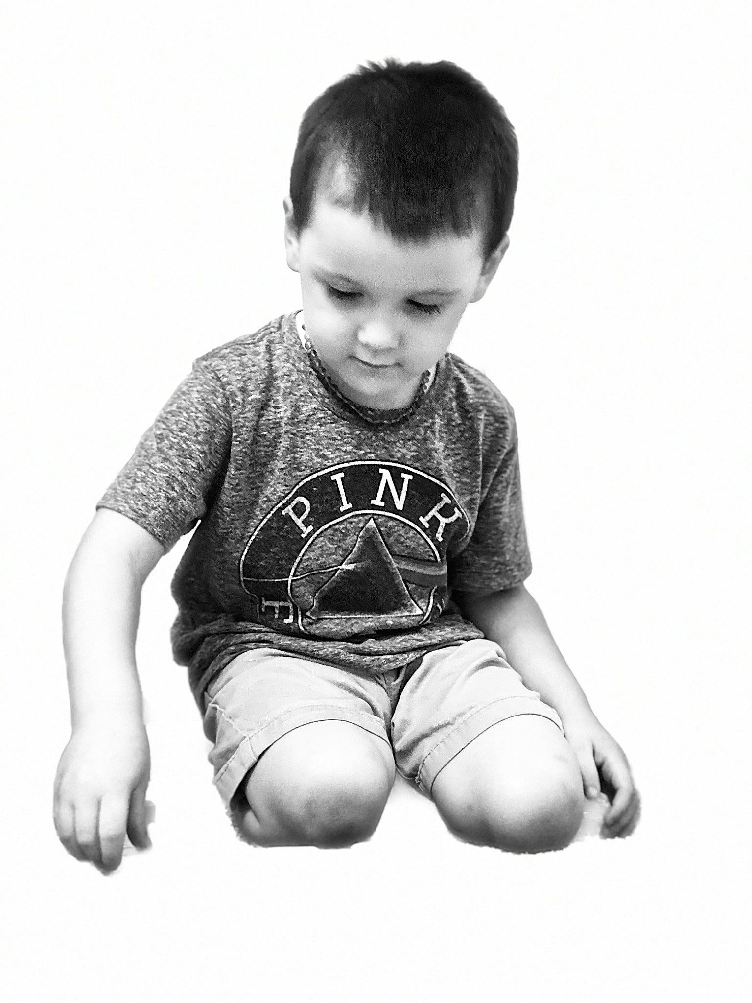 Tanner is registered to the contest to win money with this photo: baby, baby_toddler_clothing, barefoot, chin, elbow, eye, flash_photography, fun, hair, happy, head, human_body, pattern, person, shirt, shorts, shoulder, sitting, sleeve, t_shirt