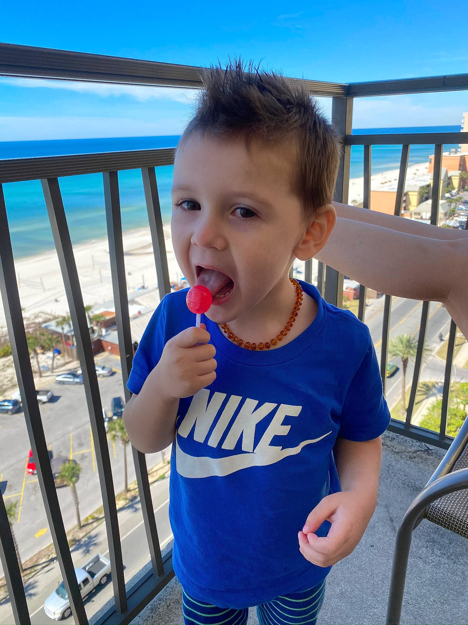 Tanner joined the competition — help win amazing prizes! azure, baby, baby_toddler_clothing, blue, child, chin, electric_blue, fence, fun, happy, leisure, person, recreation, skin, sky, sleeve, t_shirt, toddler, tourism, travel