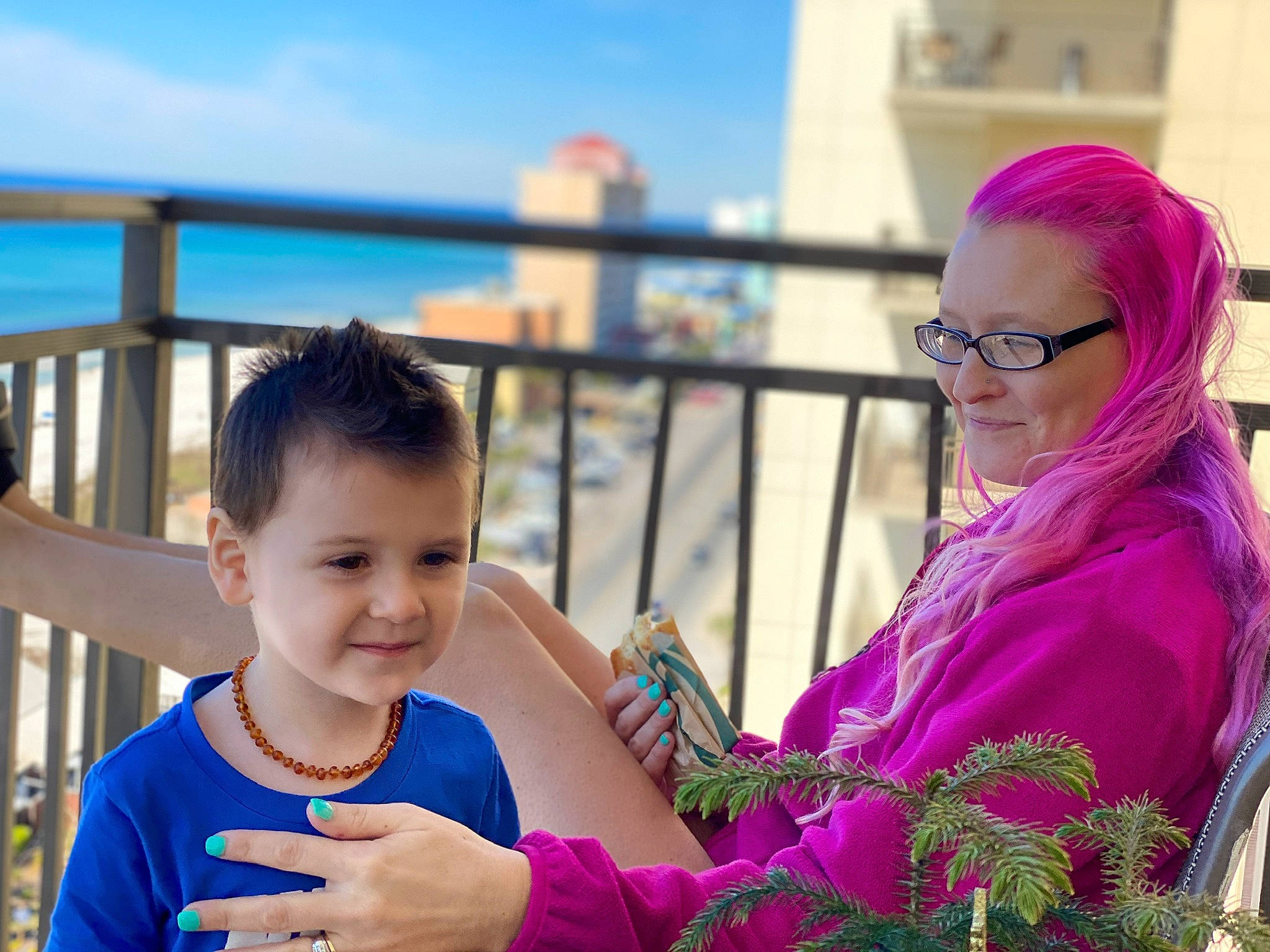 Tanner is registered to the contest to win money with this photo: beauty, blue, child, event, eyewear, fence, fun, glasses, hair, happy, jewellery, joy, leisure, magenta, person, purple, skin, sky, smile, snapshot