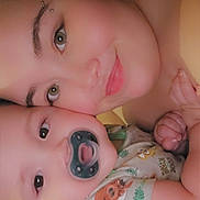 Ren joined the competition — help win amazing prizes! baby, woman, face, smile, pacifier, skin, closeup, portrait, holding, child, love, affection, happy, cute, indoors, person, head, clothing, family, together