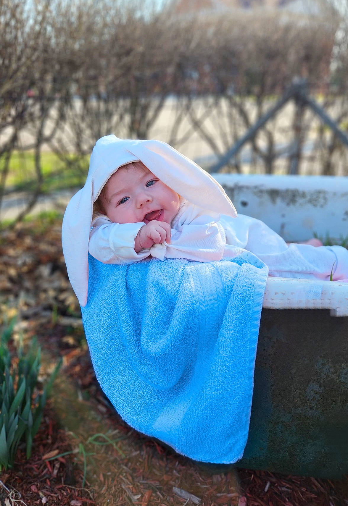 Gabriel is registered to the contest to win money with this photo: baby, baby_products, baby_toddler_clothing, cap, child, fun, grass, grassland, happy, hat, headwear, hoodie, leisure, people_in_nature, person, plant, portrait_photography, sitting, toddler, tree